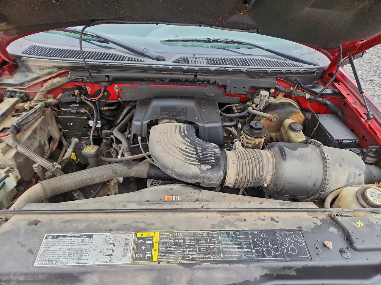 2002 Ford F150 Red vin: 2FTRF18LX2CA48918