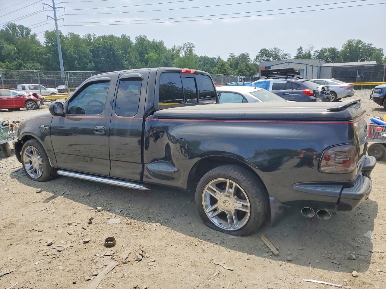 2000 Ford F150 Black vin: 2FTRX07L7YCB18022