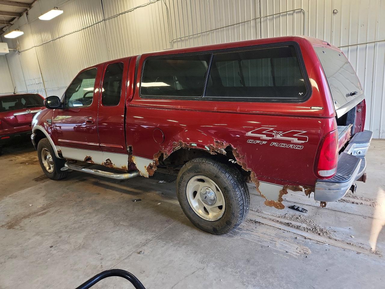 2000 Ford F150 Red vin: 2FTRX18L1YCA69016