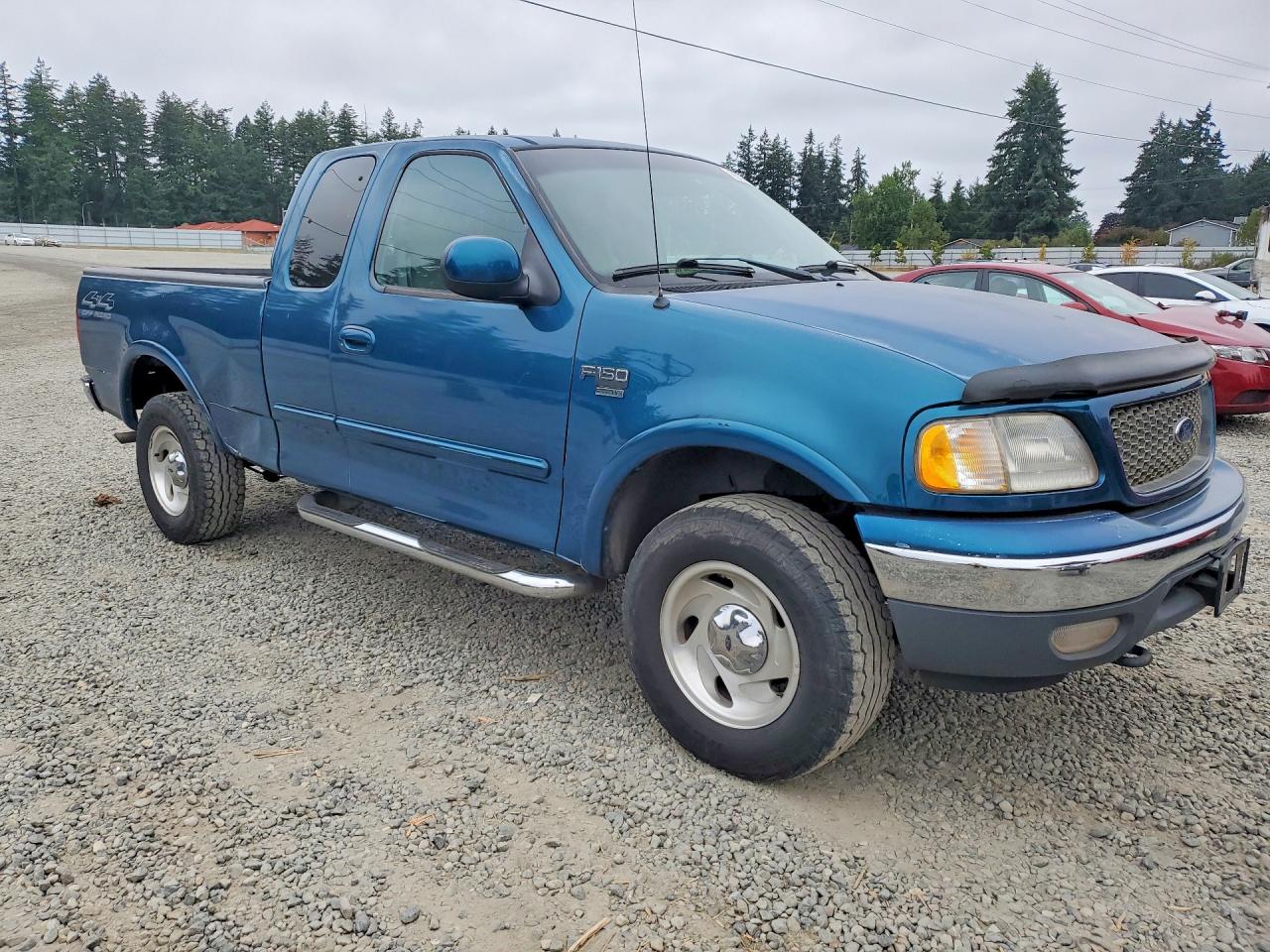 2000 Ford F150 Turquoise vin: 2FTRX18L4YCB12022