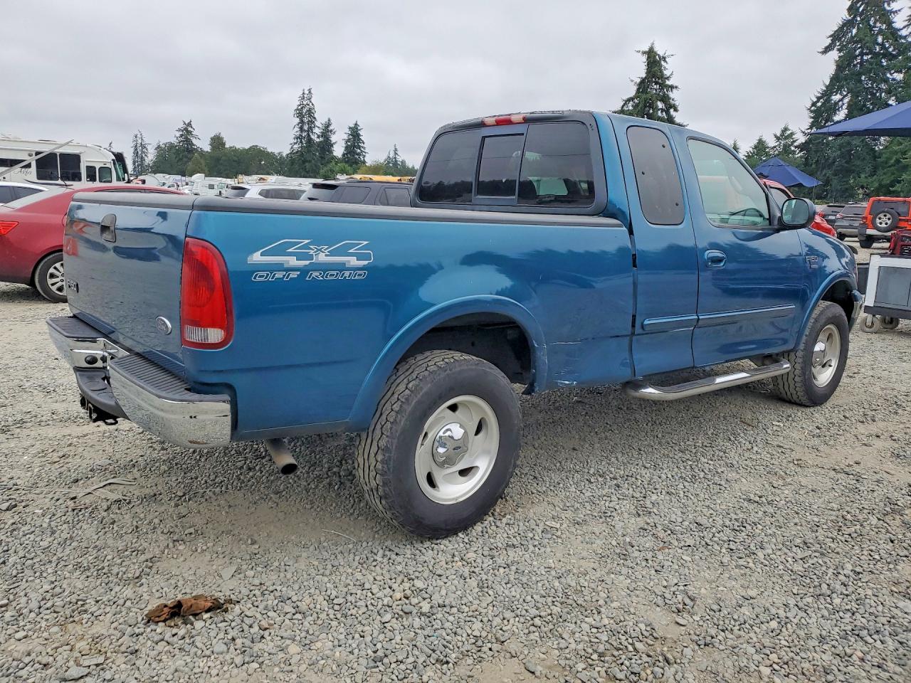 2000 Ford F150 Turquoise vin: 2FTRX18L4YCB12022