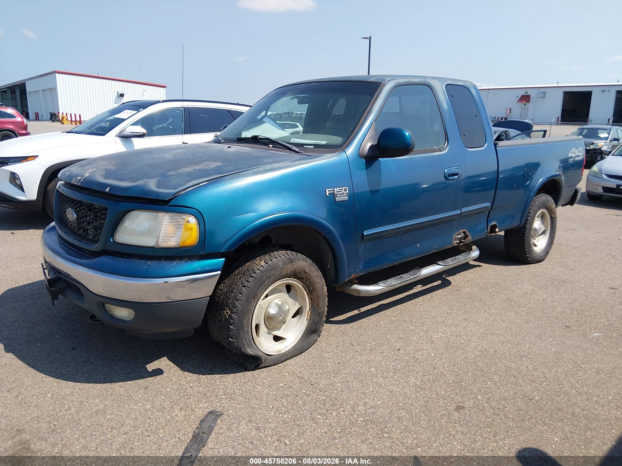 2000 Ford F-150   Blue vin: 2FTRX18LXYCB07861
