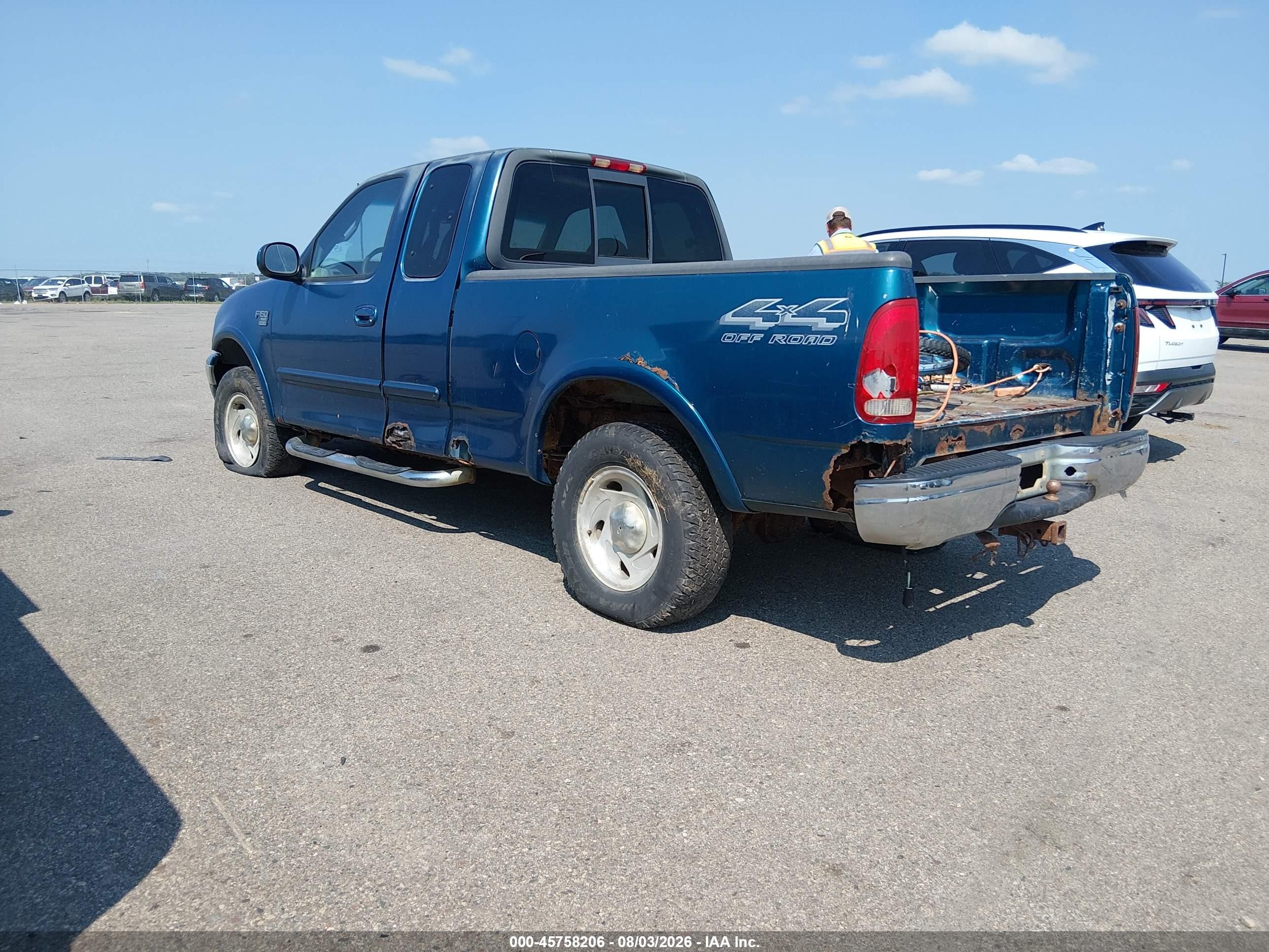 2000 Ford F-150   Blue vin: 2FTRX18LXYCB07861