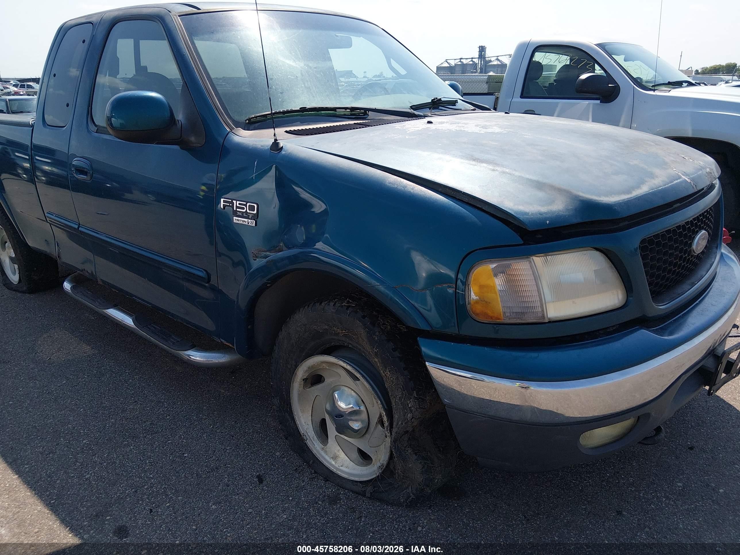 2000 Ford F-150   Blue vin: 2FTRX18LXYCB07861