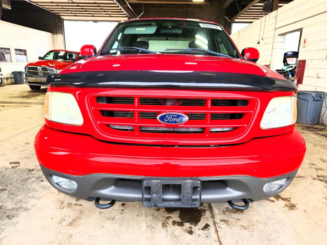 2003 Ford F150 Red vin: 2FTRX18W33CA56125
