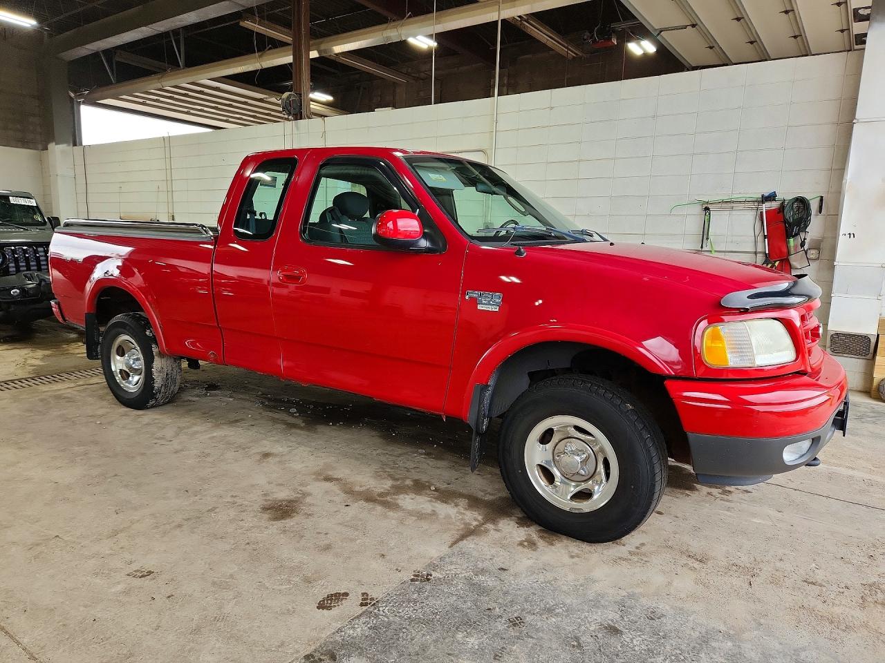 2003 Ford F150 Red vin: 2FTRX18W33CA56125