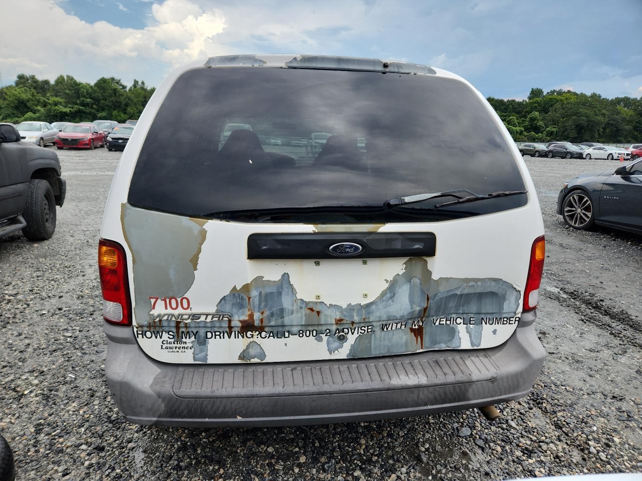 2000 Ford Windstar White vin: 2FTZA5443YBC32925 Damage: Lift Gate, Rust, > 12 Inches