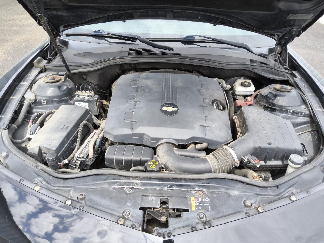 2012 Chevrolet Camaro Ls Black vin: 2G1FA1E3XC9180199 Damage: Engine, Leak, Repair Required