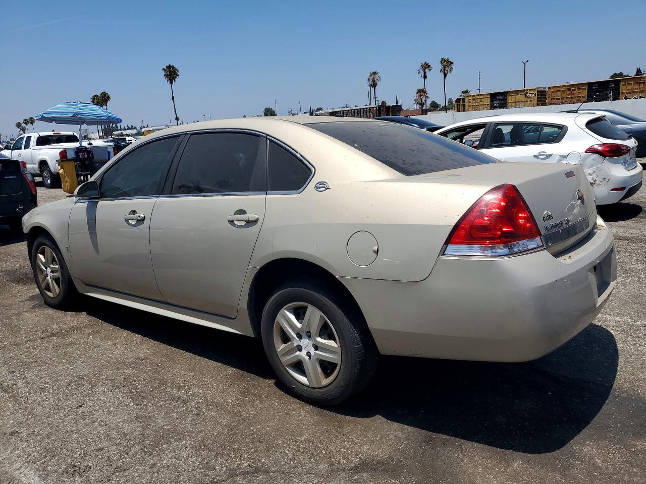 2009 Chevrolet Impala Ls Tan vin: 2G1WB57K891145287