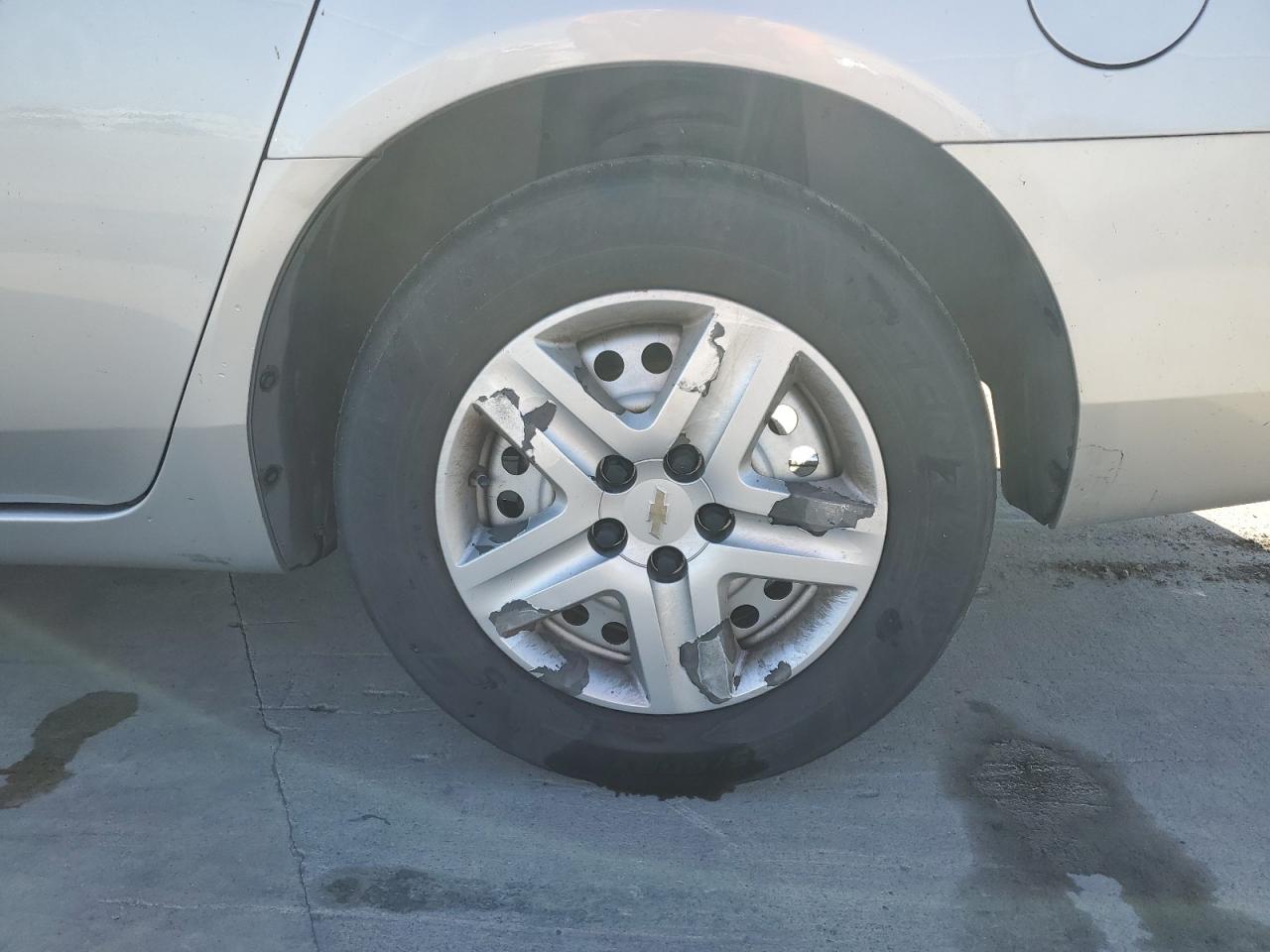 2008 Chevrolet Impala Ls Silver vin: 2G1WB58N881344296 Damage: Left Rear Wheel, Peeling, 4 To 5 Inches