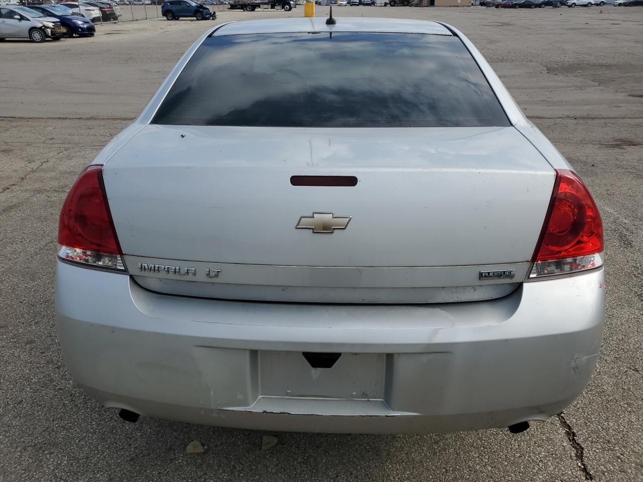 2013 Chevrolet Impala Lt Серебряный vin: 2G1WB5E38D1251582 Damage: Rear Bumper, Chipped, 10 Or More
