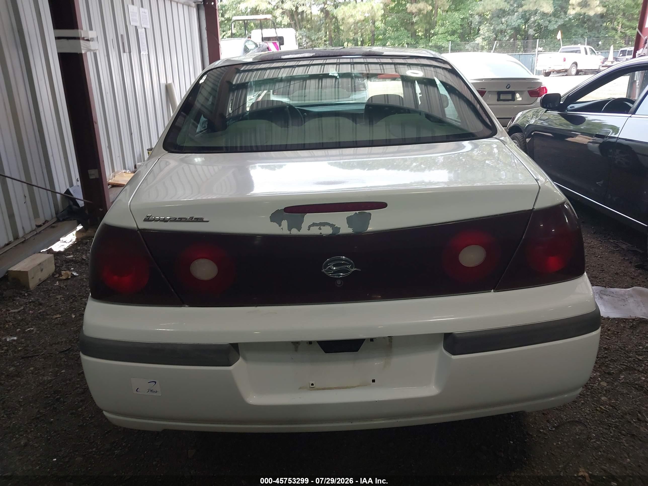 2000 Chevrolet Impala   White vin: 2G1WF52E0Y9152319