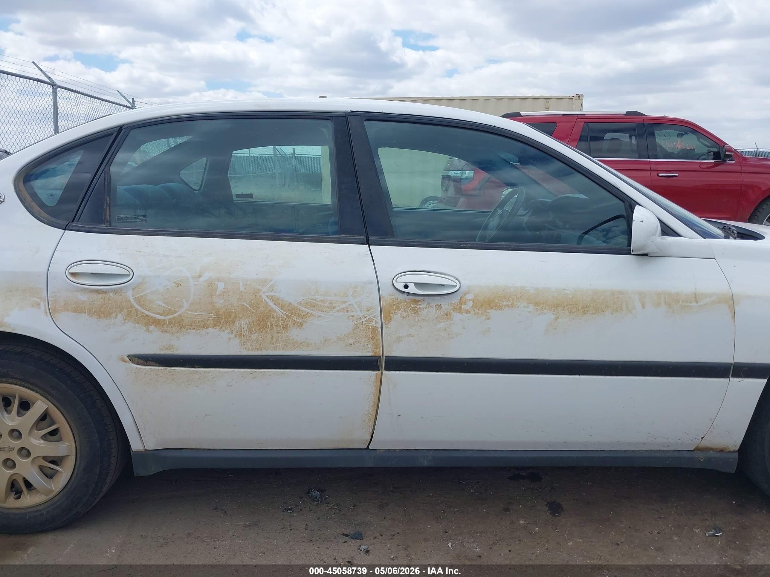 2000 Chevrolet Impala   White vin: 2G1WF55E4Y9242228