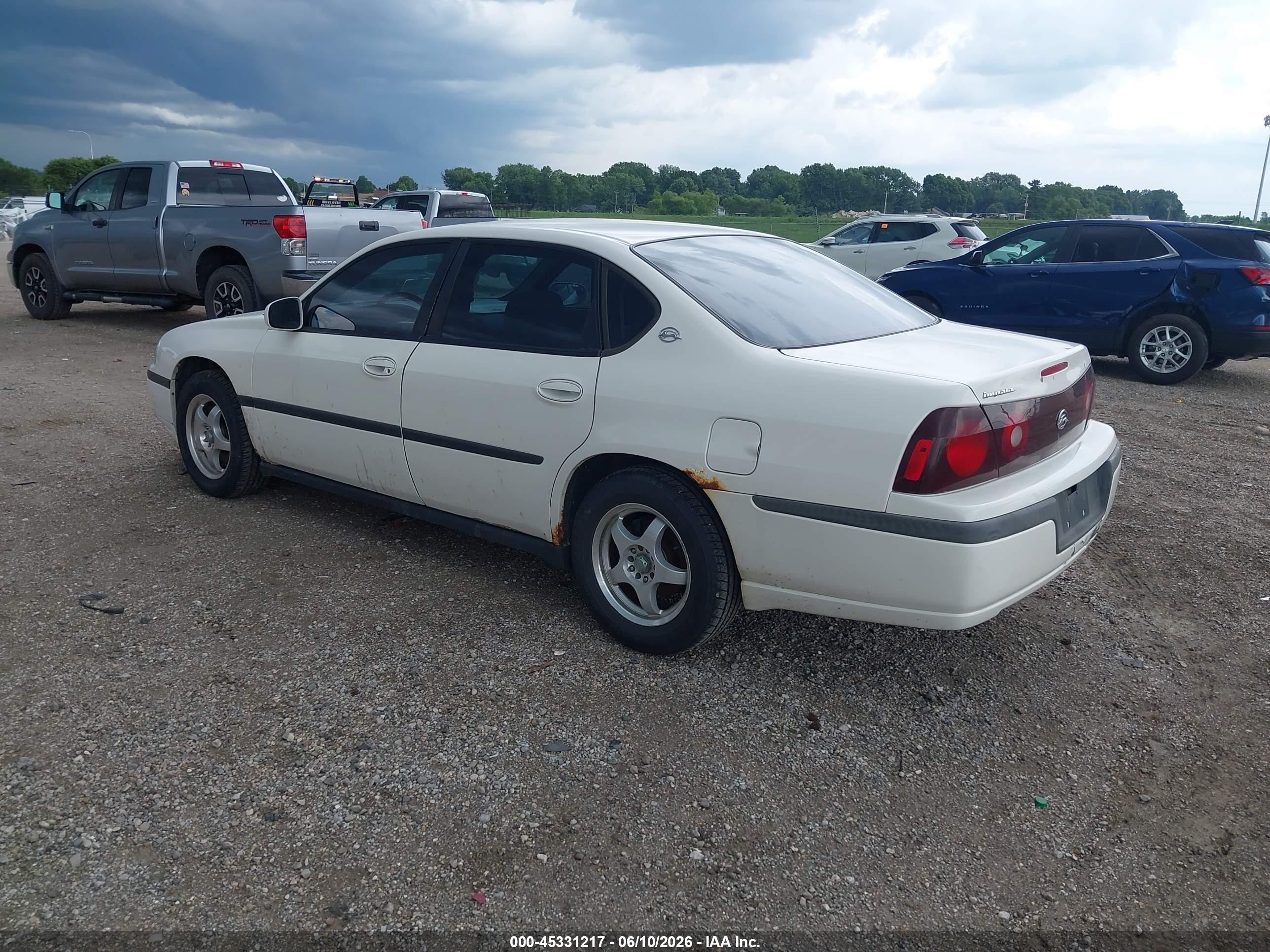 2001 Chevrolet Impala   White vin: 2G1WF55E519360939