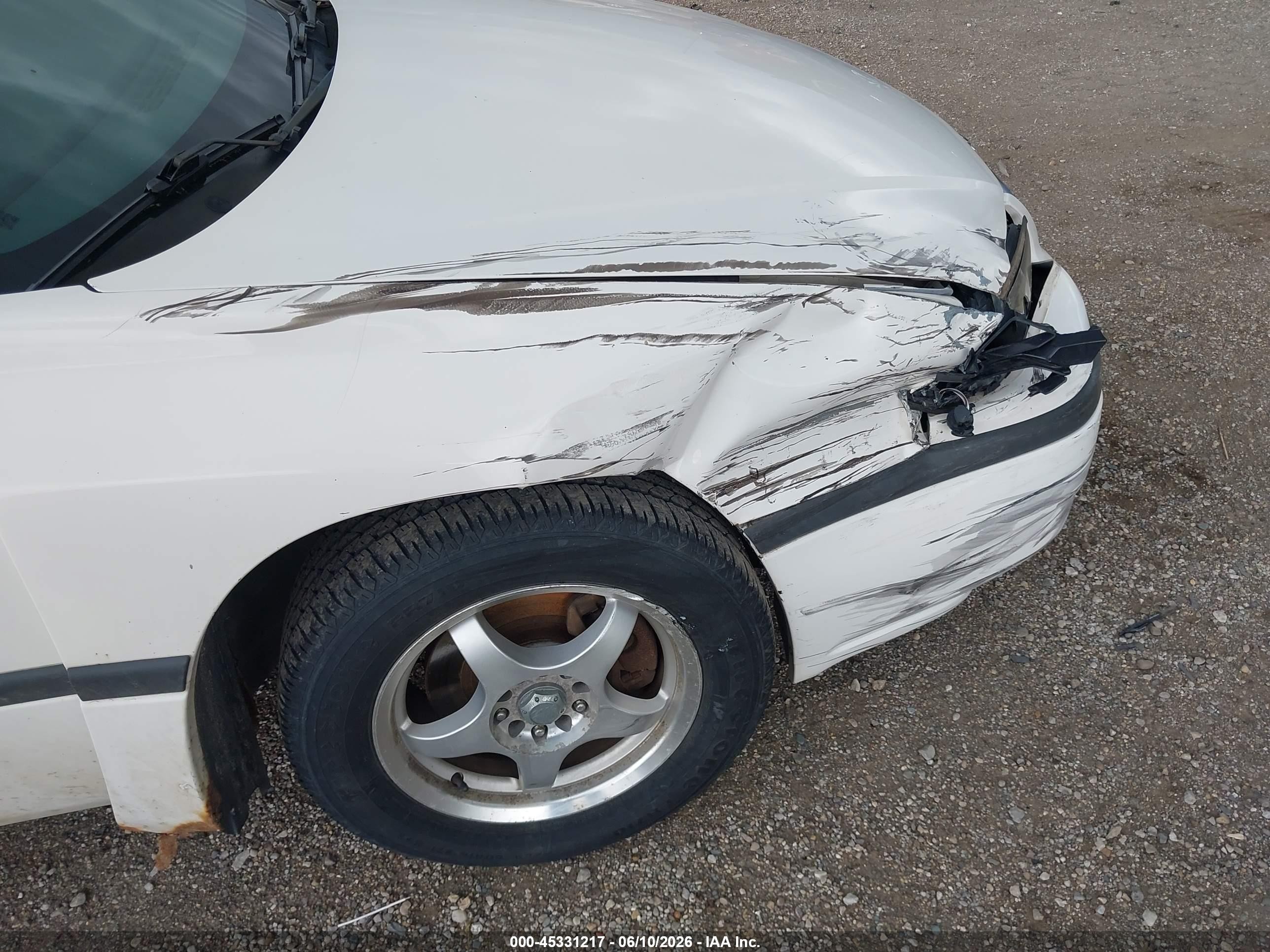 2001 Chevrolet Impala   White vin: 2G1WF55E519360939
