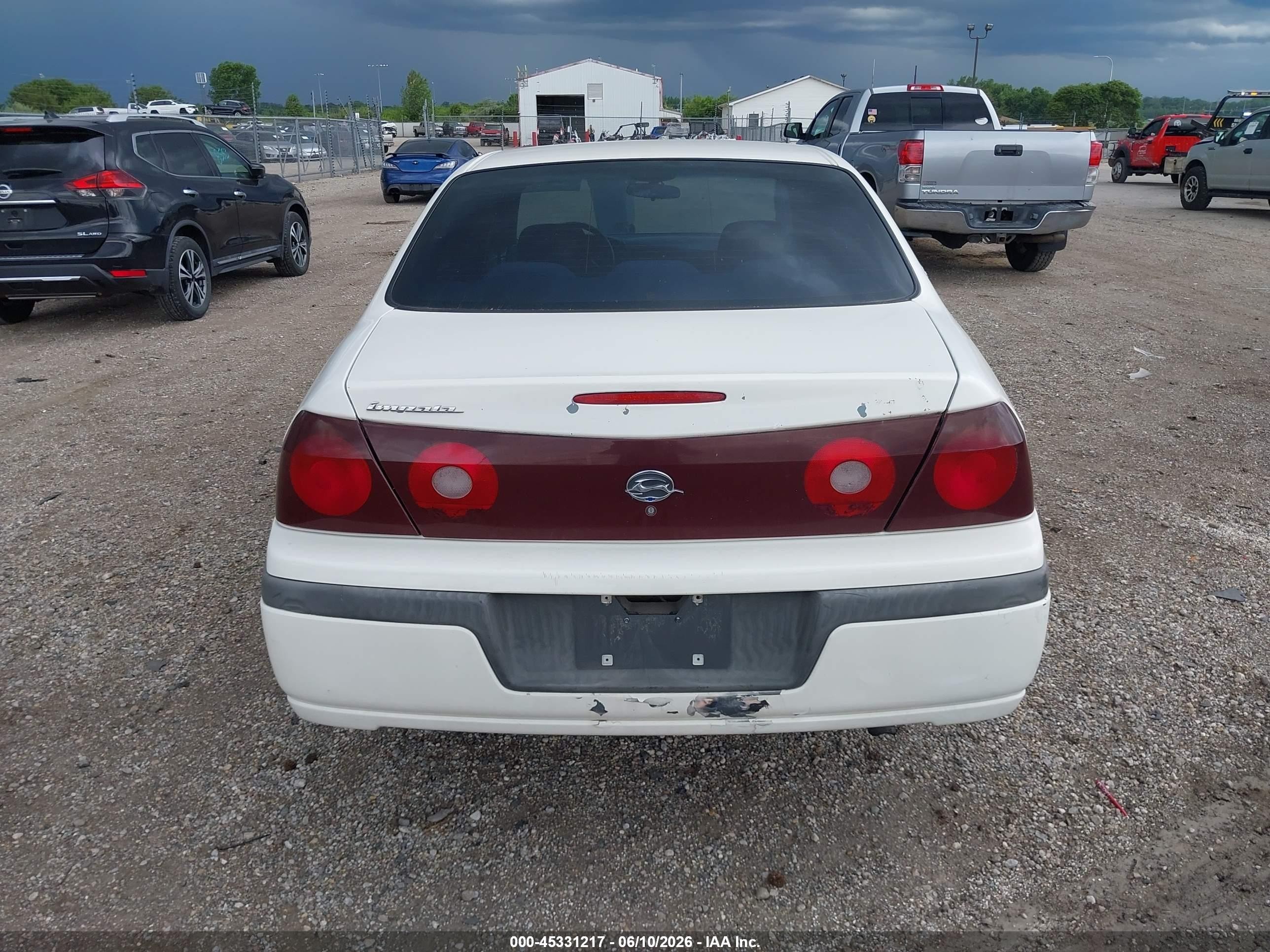 2001 Chevrolet Impala   White vin: 2G1WF55E519360939