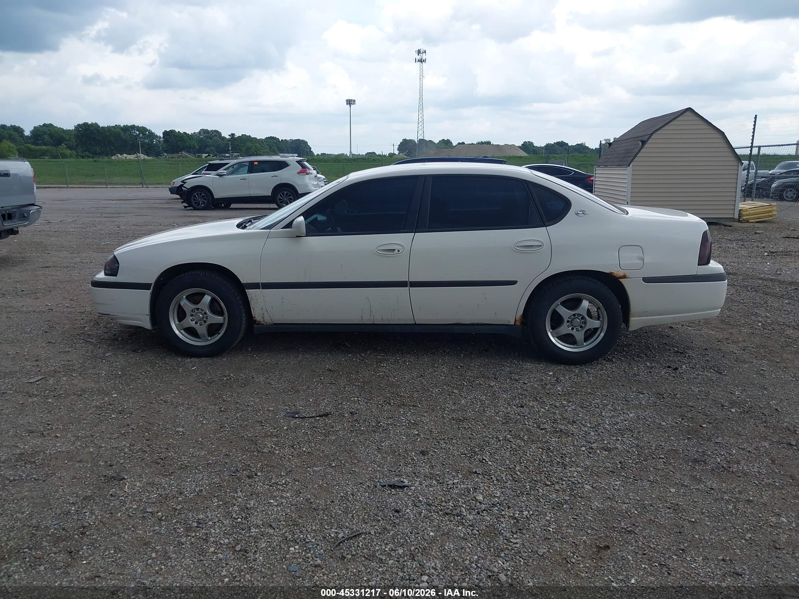 2001 Chevrolet Impala   White vin: 2G1WF55E519360939