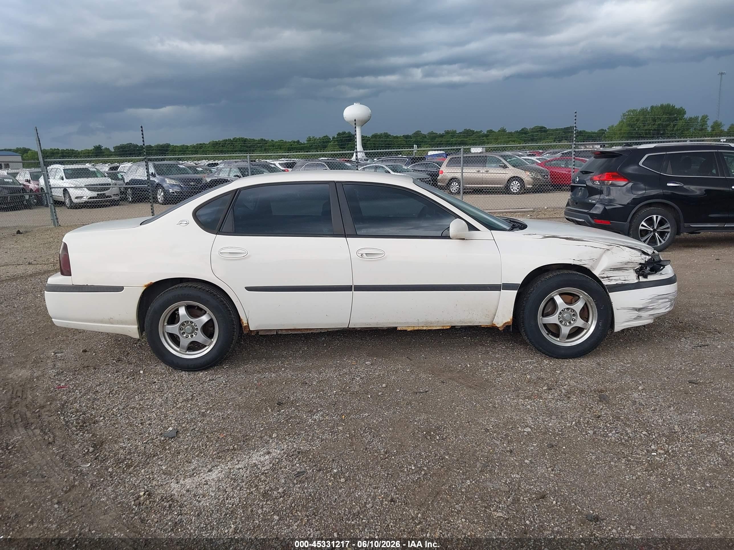 2001 Chevrolet Impala   White vin: 2G1WF55E519360939