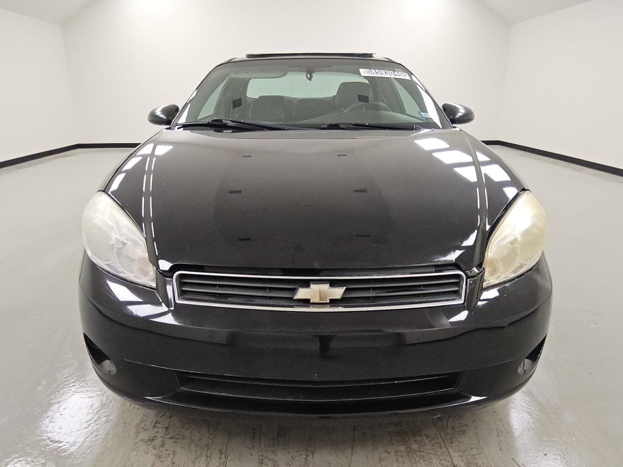 2006 Chevrolet Monte Carlo Ls Black vin: 2G1WJ15K169419005 Damage: Left Head Lamp, Faded, Repair Required