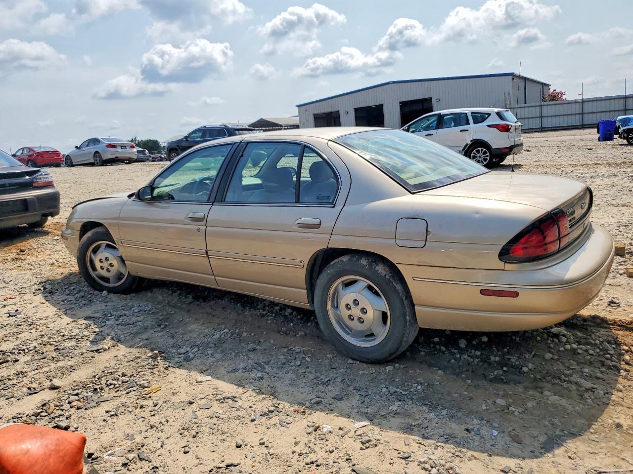 1999 Chevrolet Lumina Base Brown vin: 2G1WL52M0X9138595