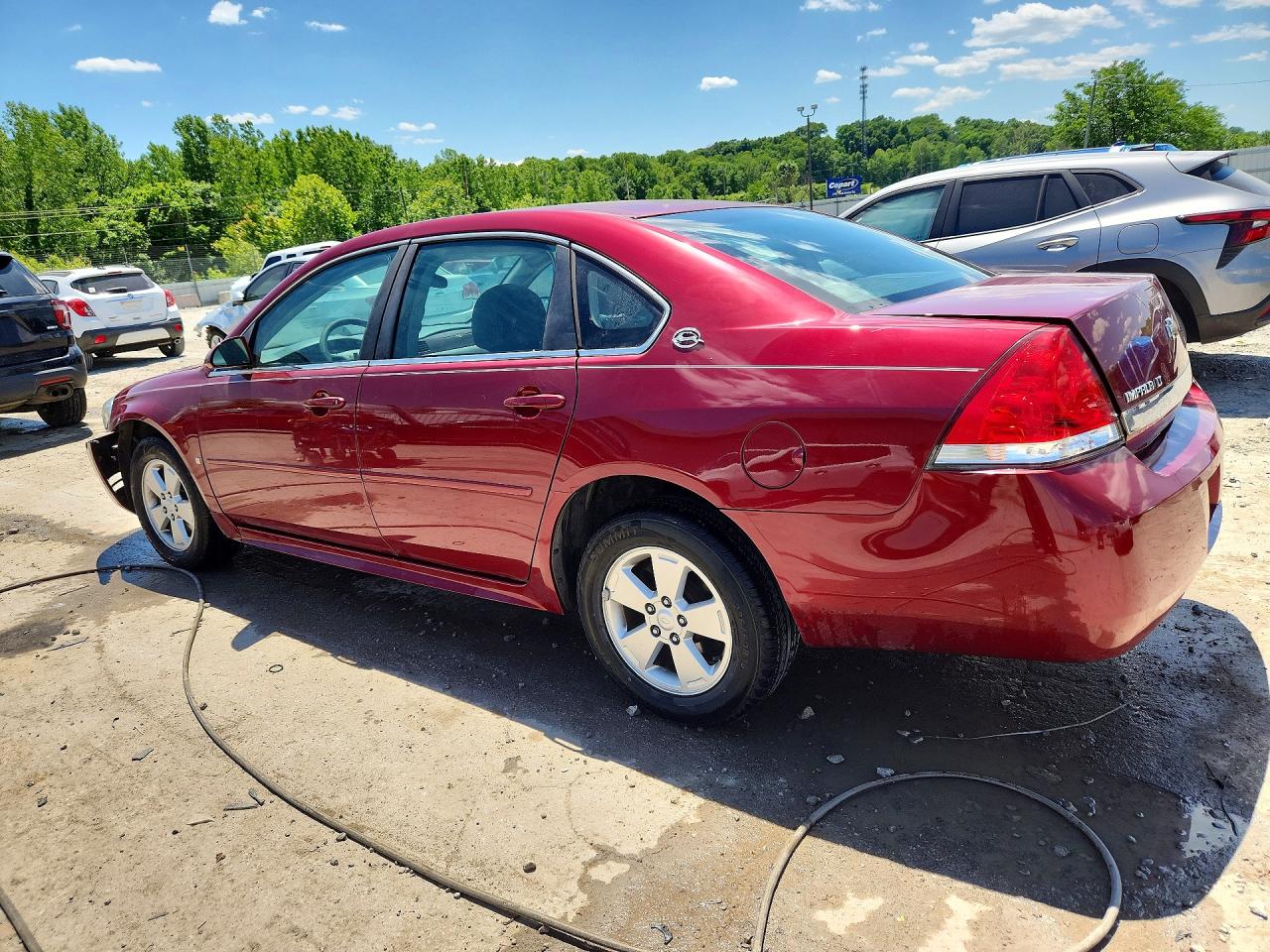 2009 Chevrolet Impala 1lt Red vin: 2G1WT57K191263162