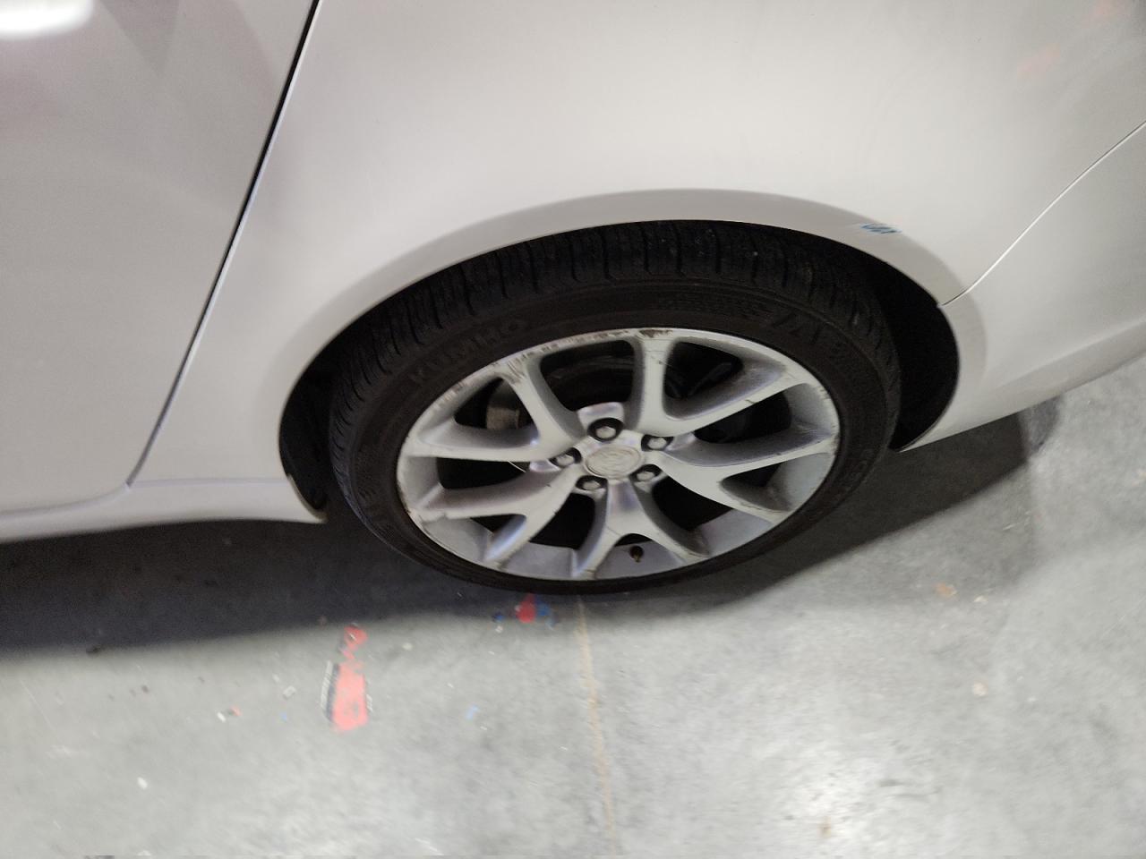 2012 Buick Regal Gs White vin: 2G4GV5GV6C9193534 Damage: Left Rear Wheel, Curb Rash, > 12 Inches