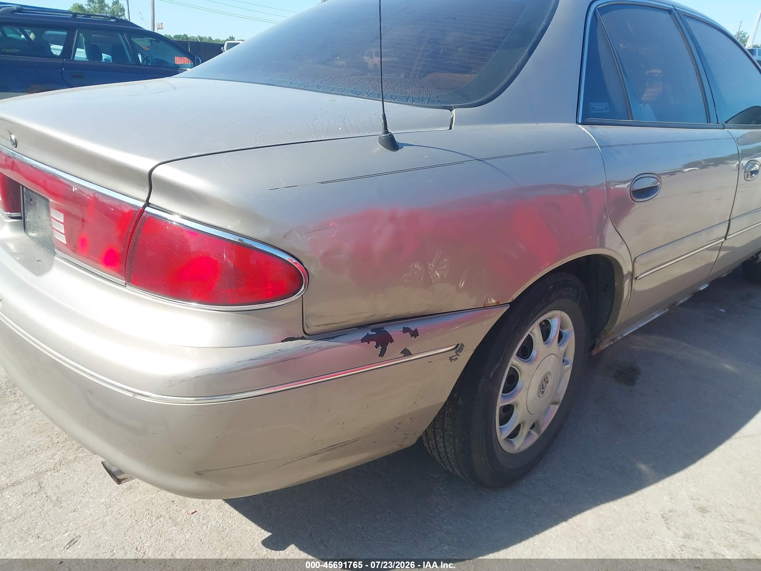 2001 Buick Century Custom Tan vin: 2G4WS52J611253056