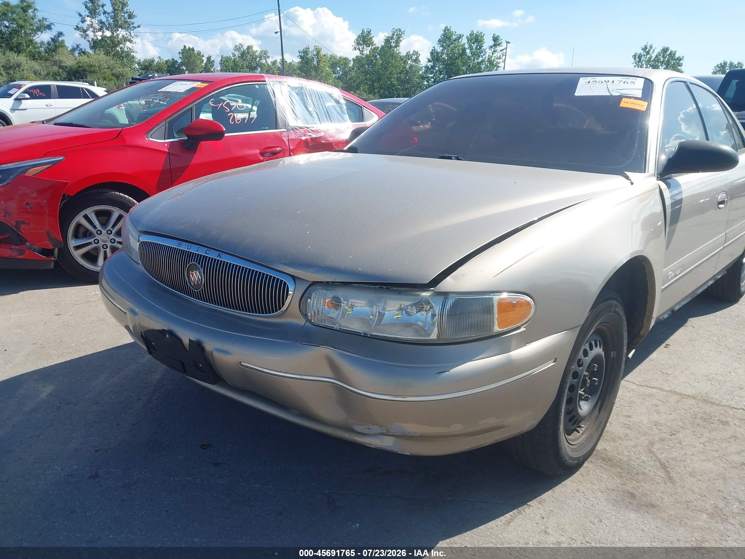 2001 Buick Century Custom Tan vin: 2G4WS52J611253056