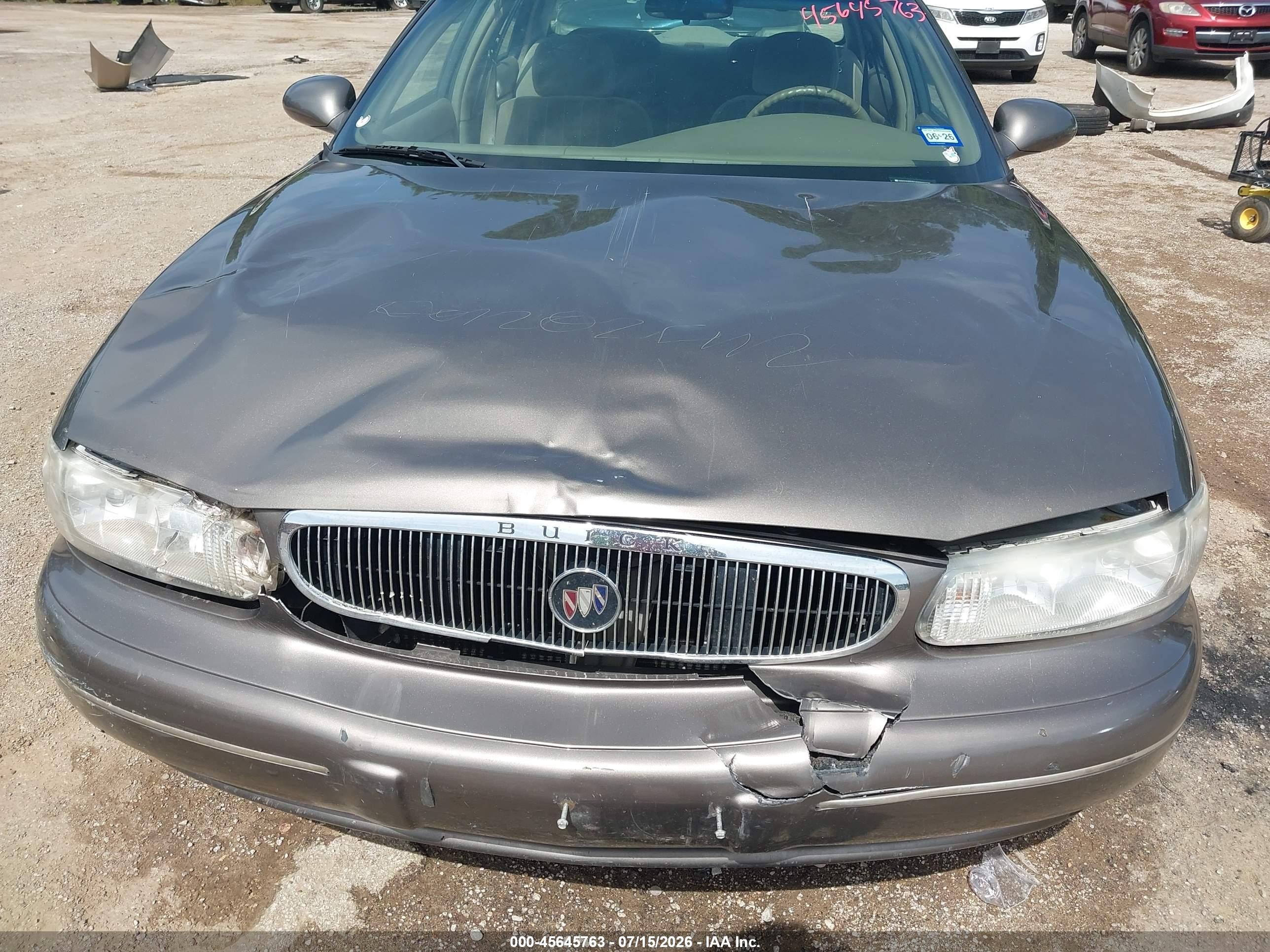 2002 Buick Century Custom Tan vin: 2G4WS52J721291588