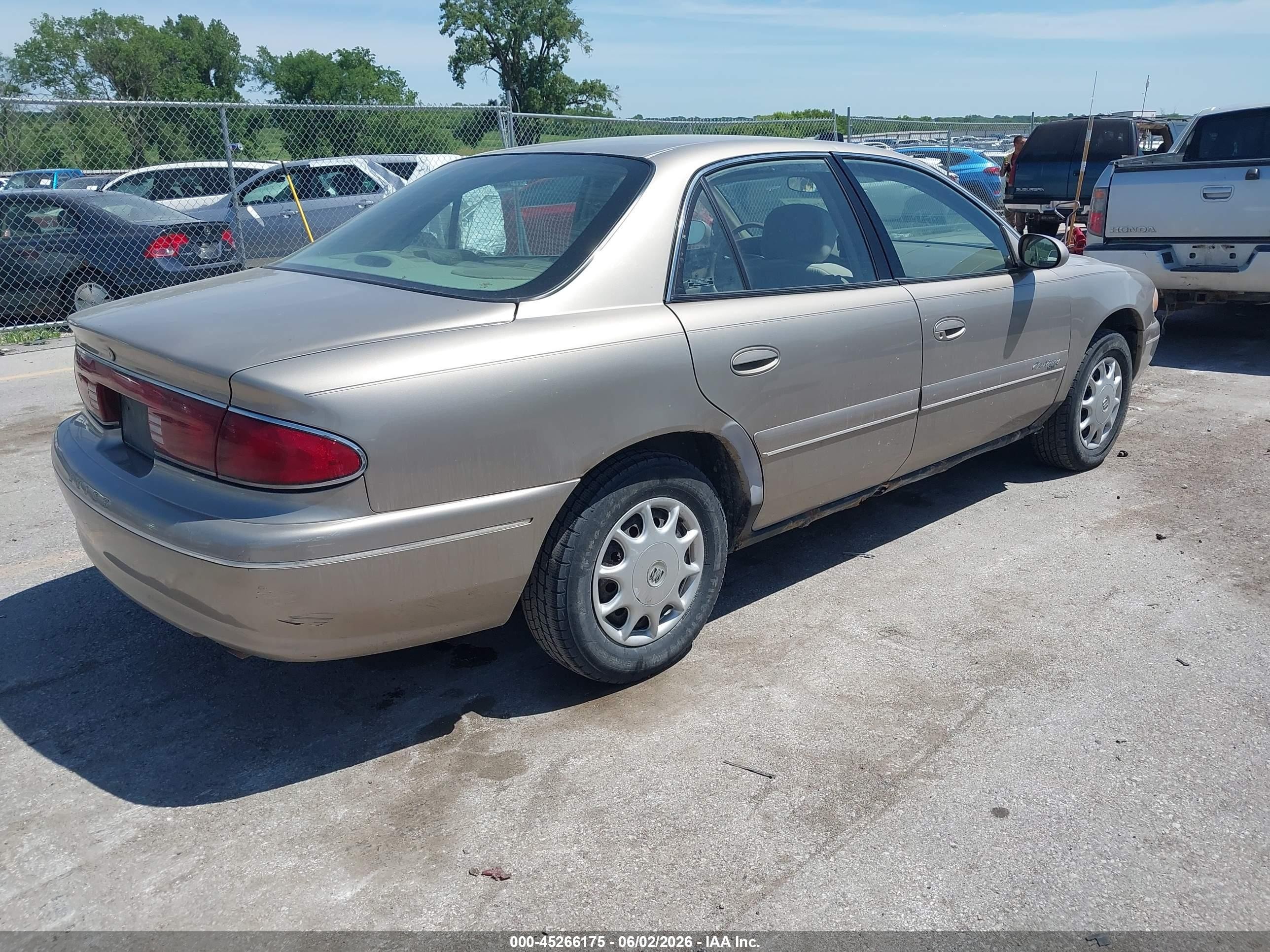 2001 Buick Century Custom Tan vin: 2G4WS52J911317848
