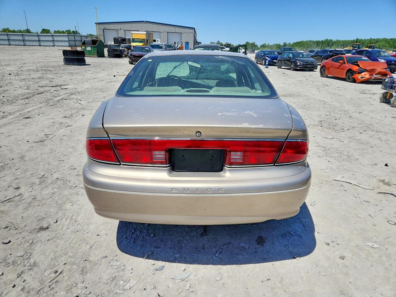 2000 Buick Century Custom Золотой vin: 2G4WS52JXY1343627