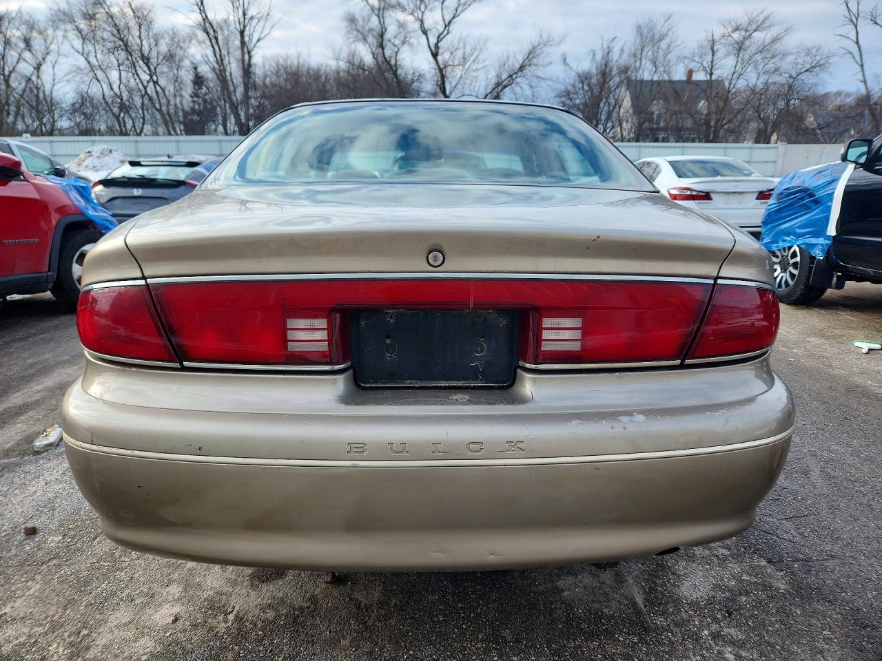 1998 Buick Century Custom Tan vin: 2G4WS52M0W1438205