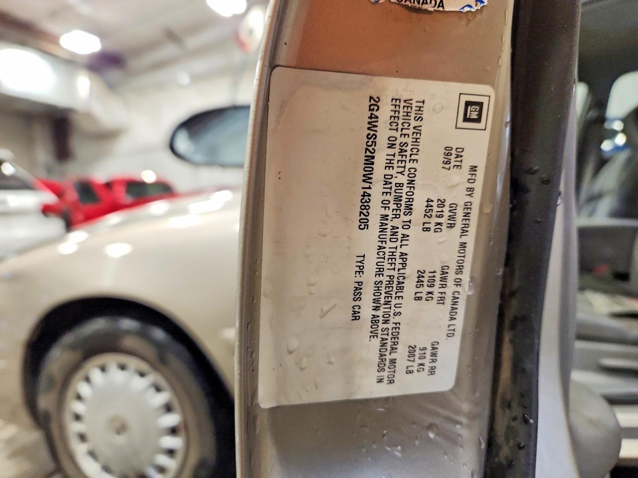 1998 Buick Century Custom Tan vin: 2G4WS52M0W1438205