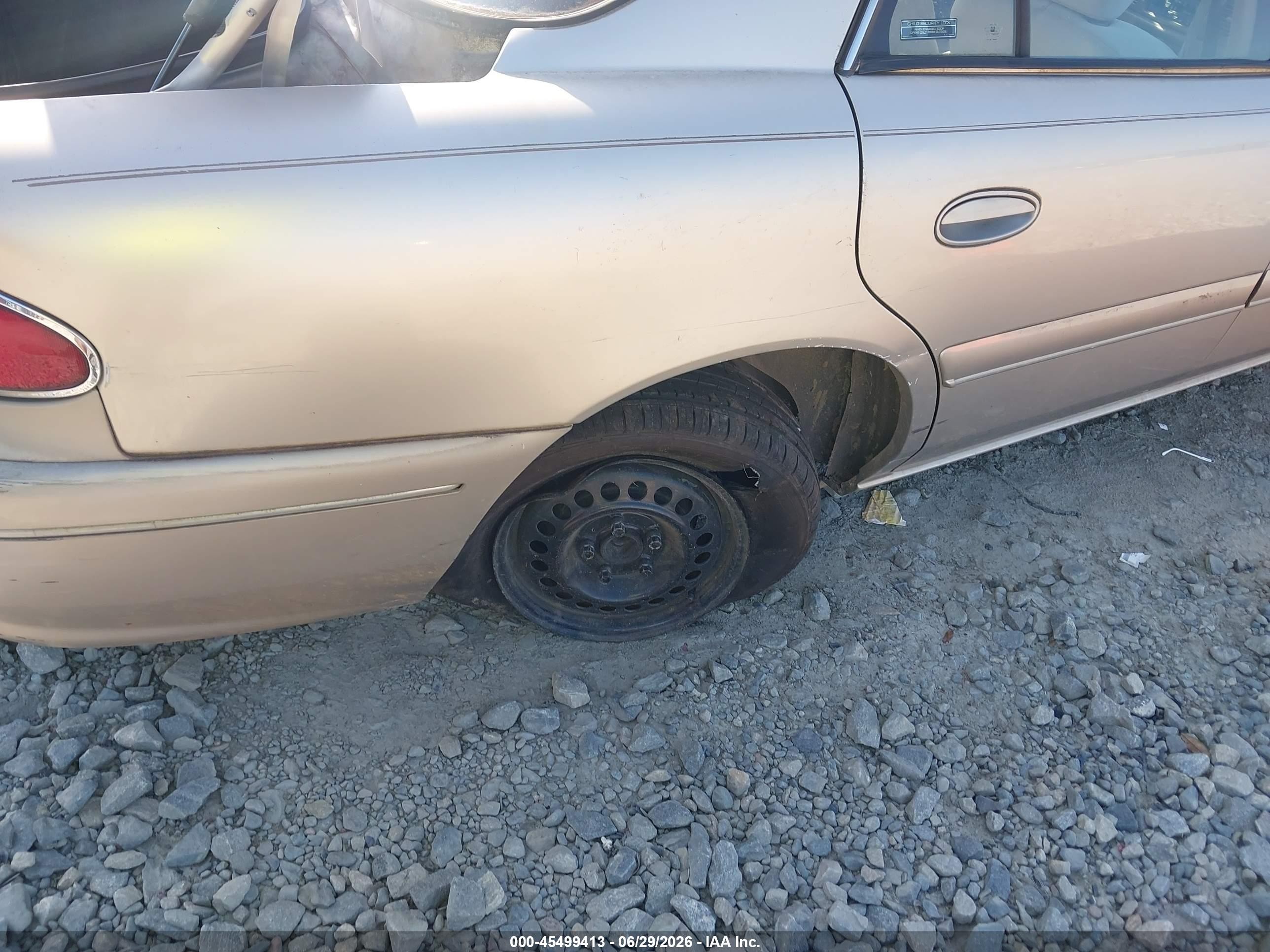 1999 Buick Century Custom Champagne vin: 2G4WS52M1X1440336
