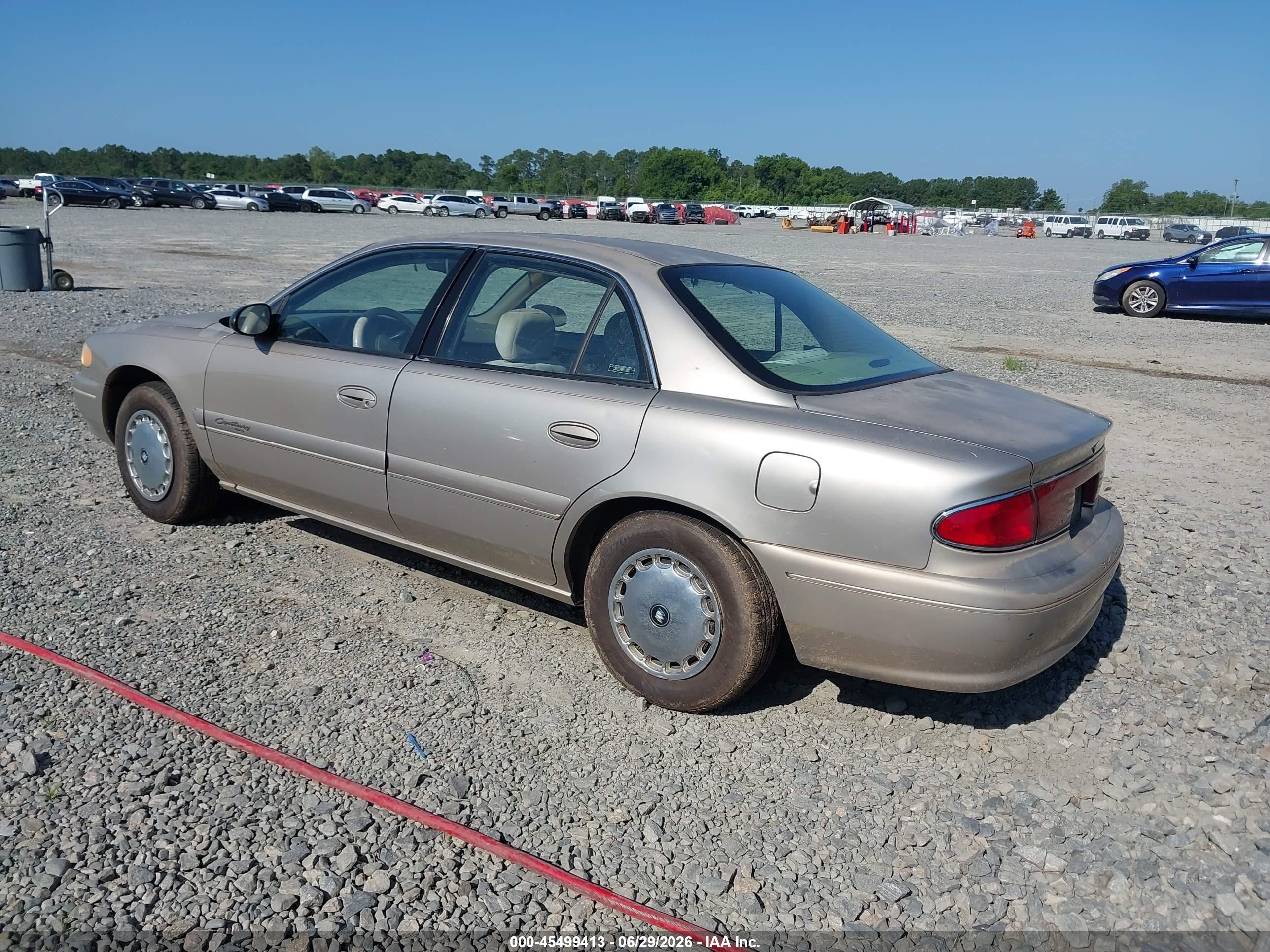 1999 Buick Century Custom Champagne vin: 2G4WS52M1X1440336