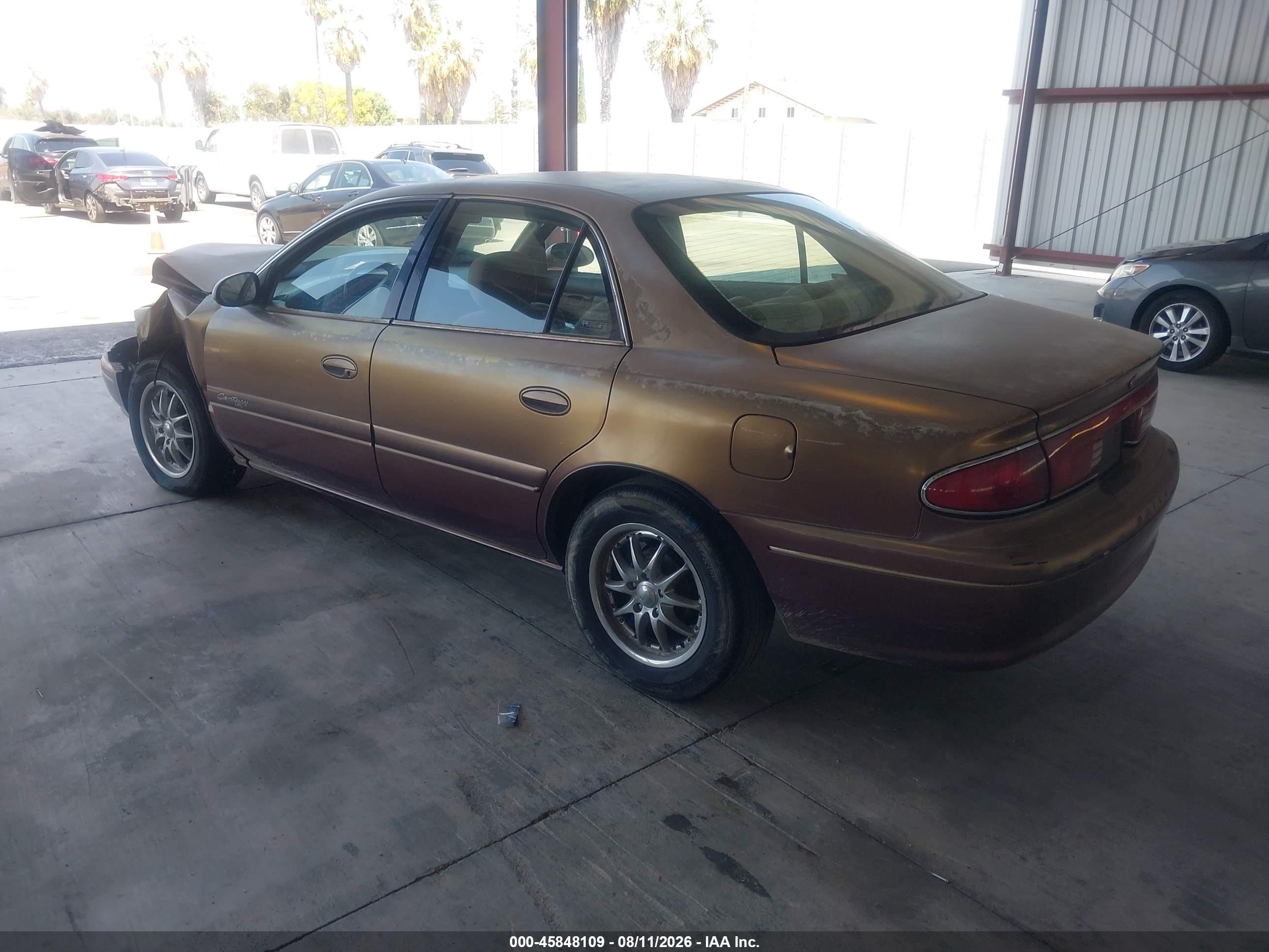 1999 Buick Century Custom Gold vin: 2G4WS52M3X1448695
