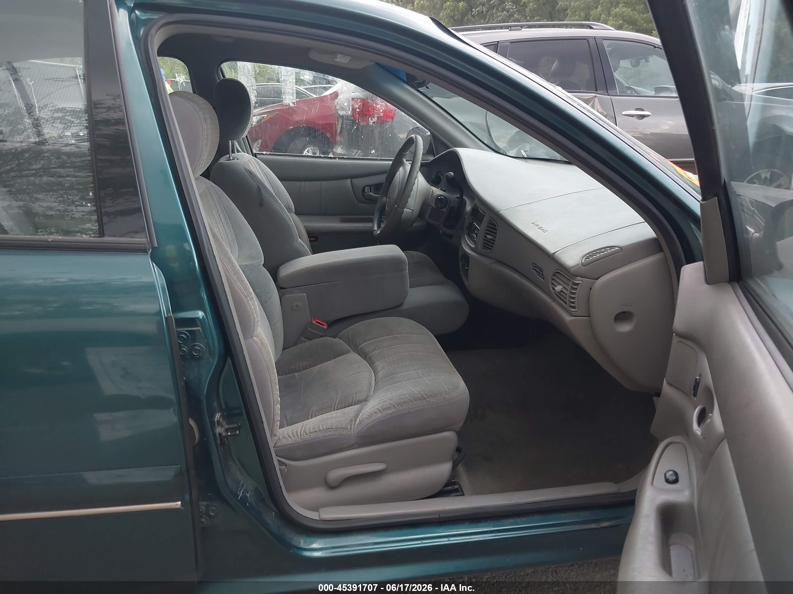 1999 Buick Century Custom Turquoise vin: 2G4WS52M9X1477912