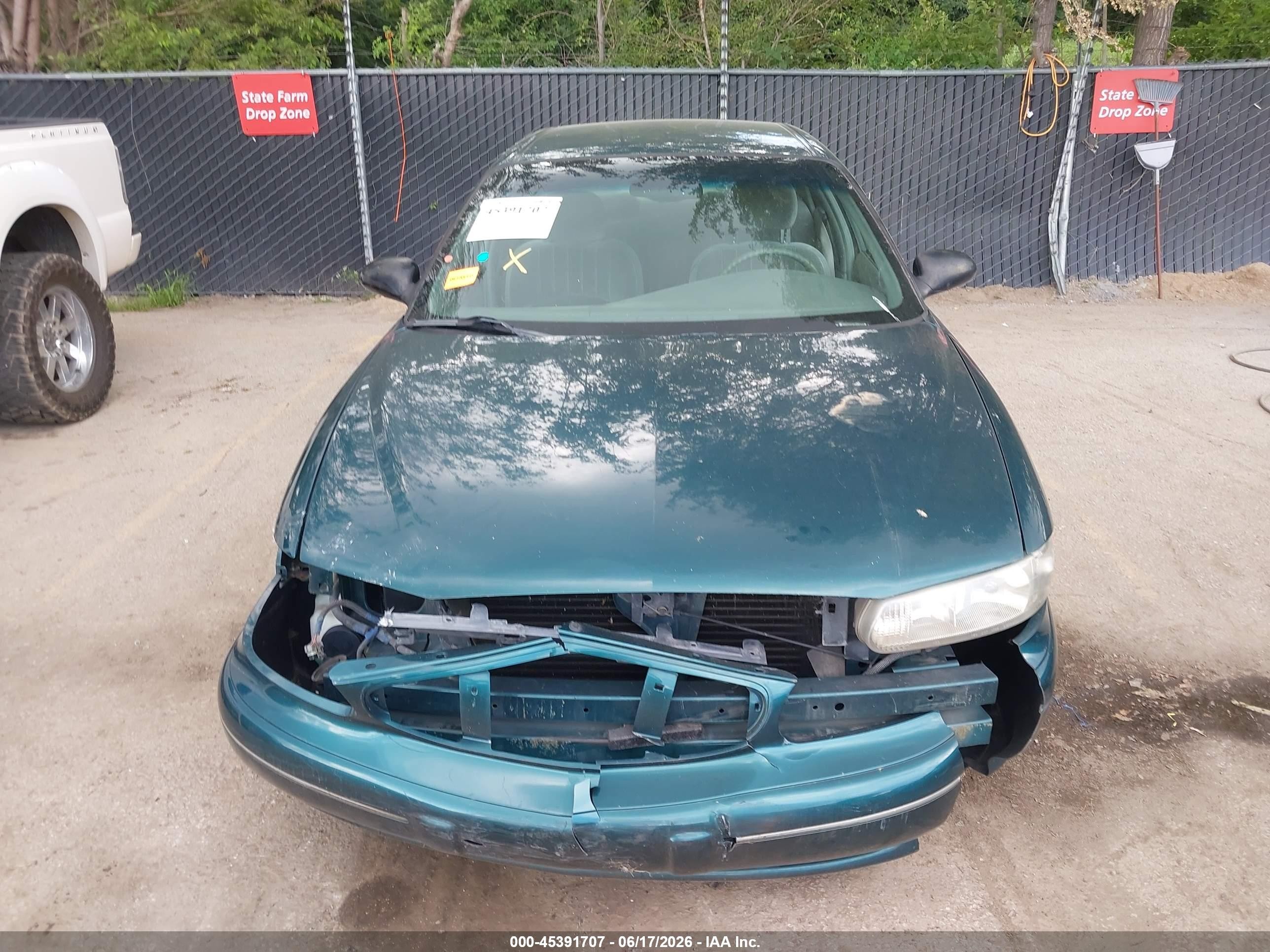 1999 Buick Century Custom Turquoise vin: 2G4WS52M9X1477912