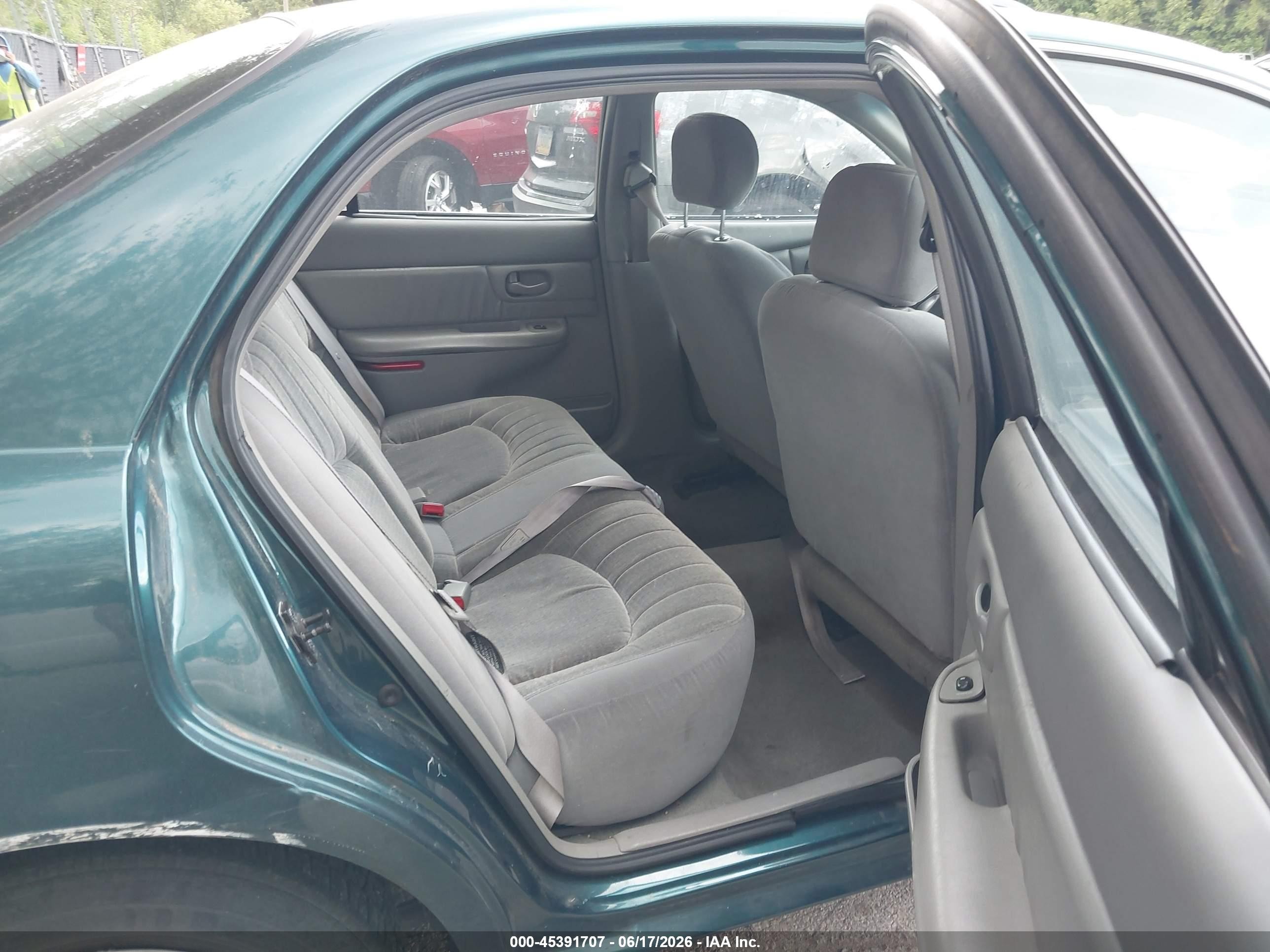 1999 Buick Century Custom Turquoise vin: 2G4WS52M9X1477912