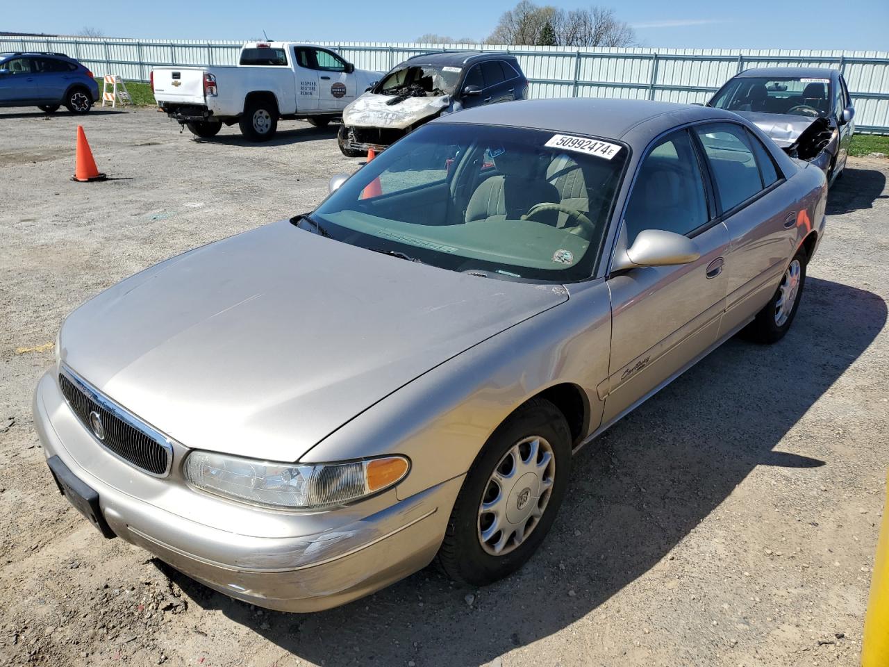 1998 Buick Century Custom Tan vin: 2G4WS52MXW1612314