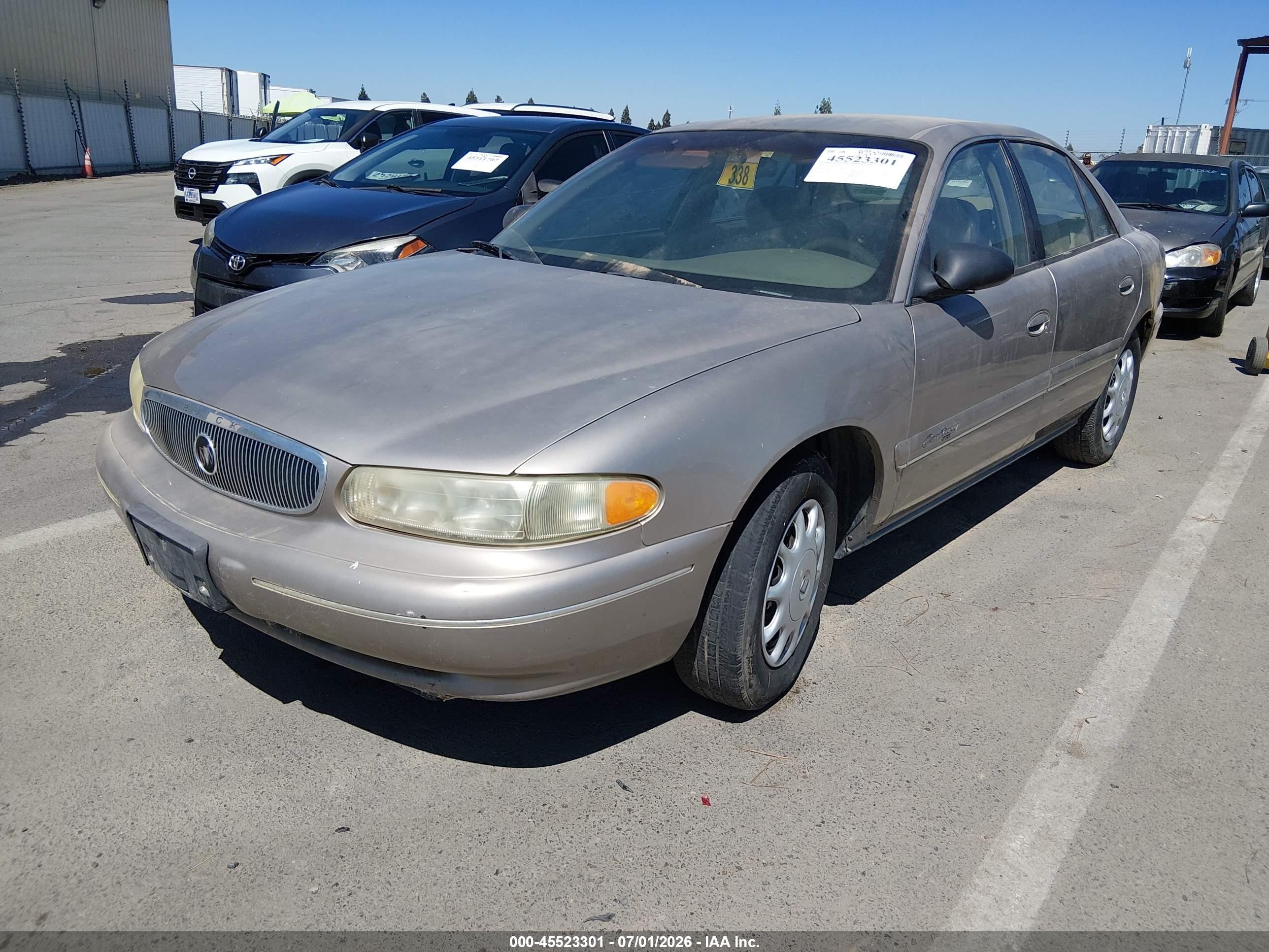 1999 Buick Century Custom Tan vin: 2G4WS52MXX1427777