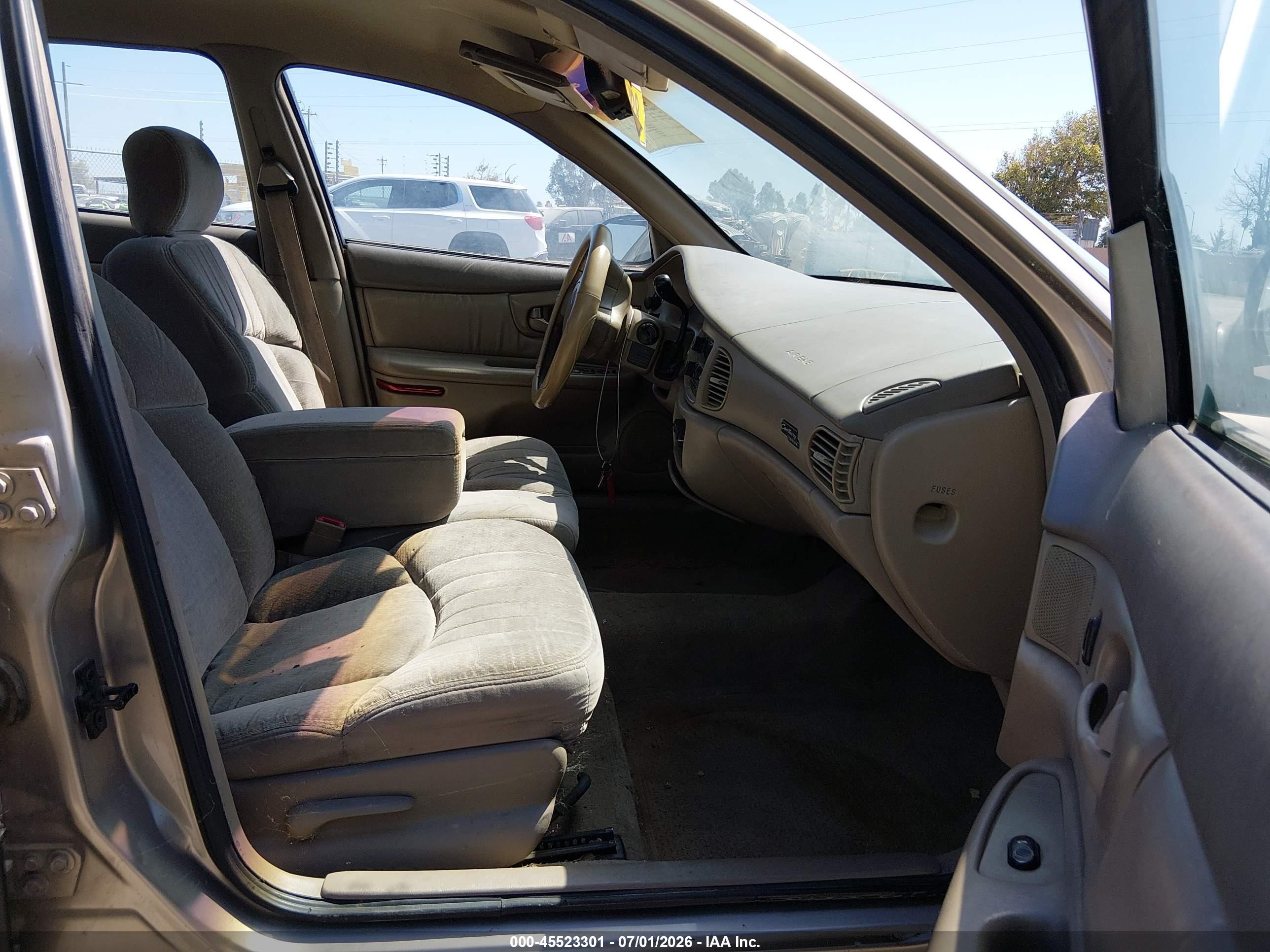 1999 Buick Century Custom Tan vin: 2G4WS52MXX1427777