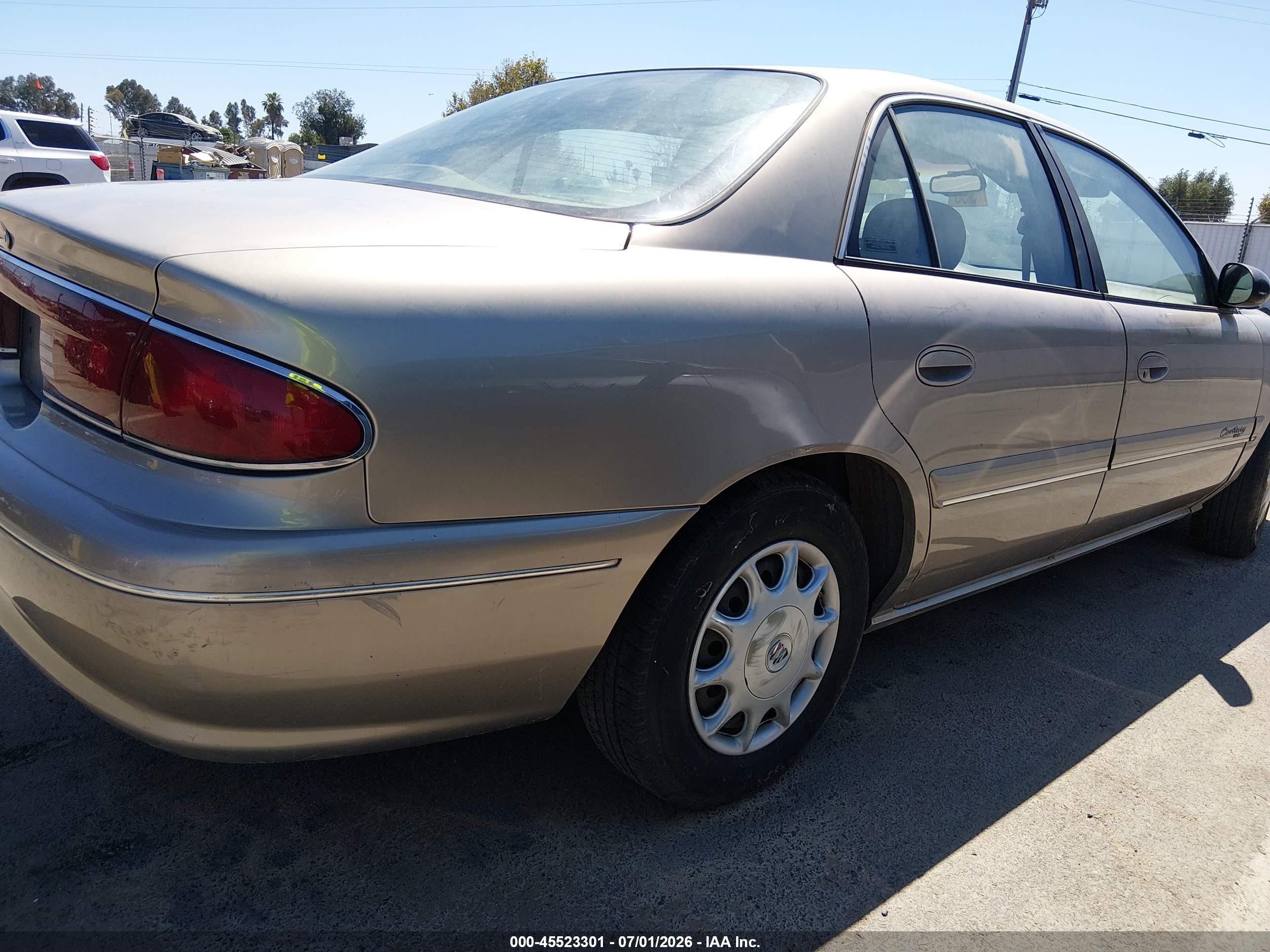 1999 Buick Century Custom Tan vin: 2G4WS52MXX1427777