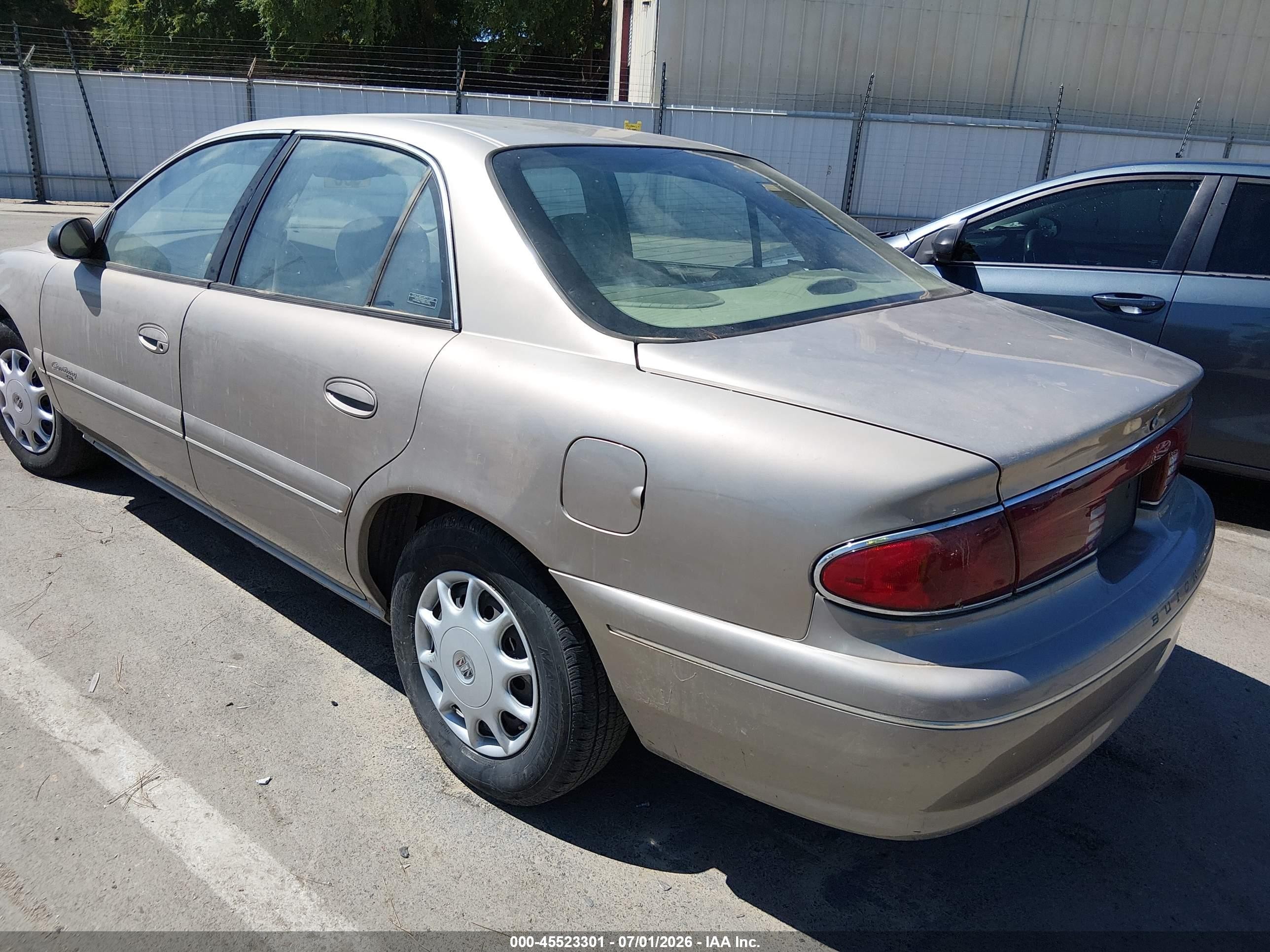 1999 Buick Century Custom Tan vin: 2G4WS52MXX1427777