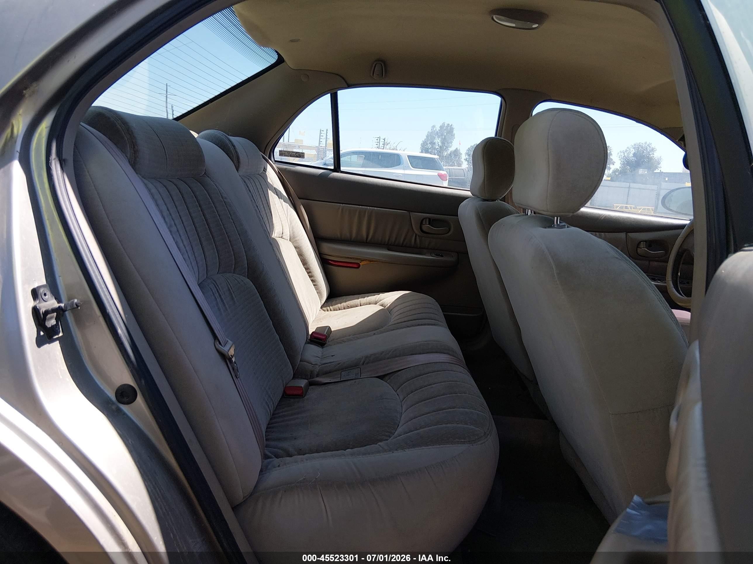 1999 Buick Century Custom Tan vin: 2G4WS52MXX1427777