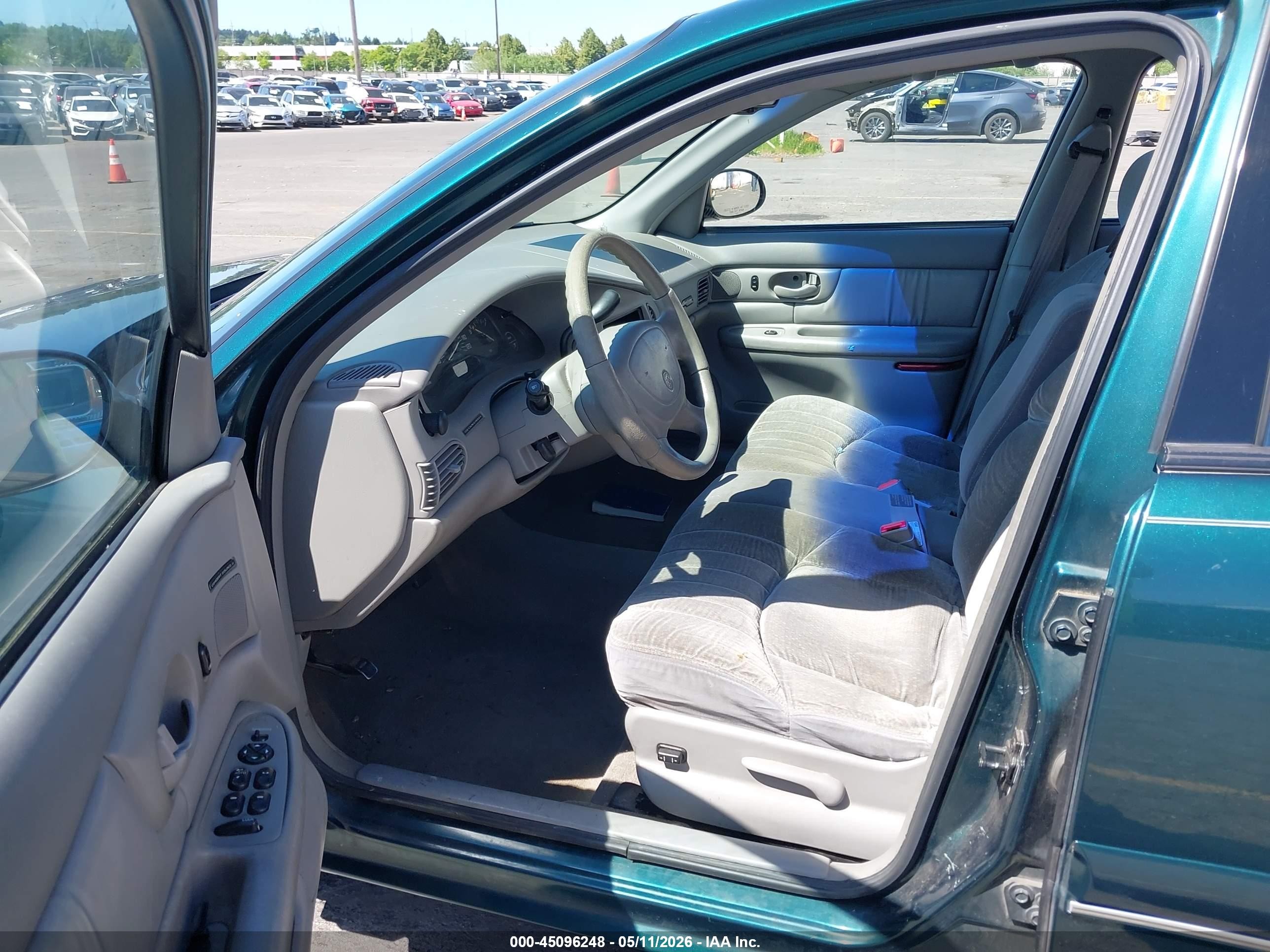 1999 Buick Century Custom Green vin: 2G4WS52MXX1607261