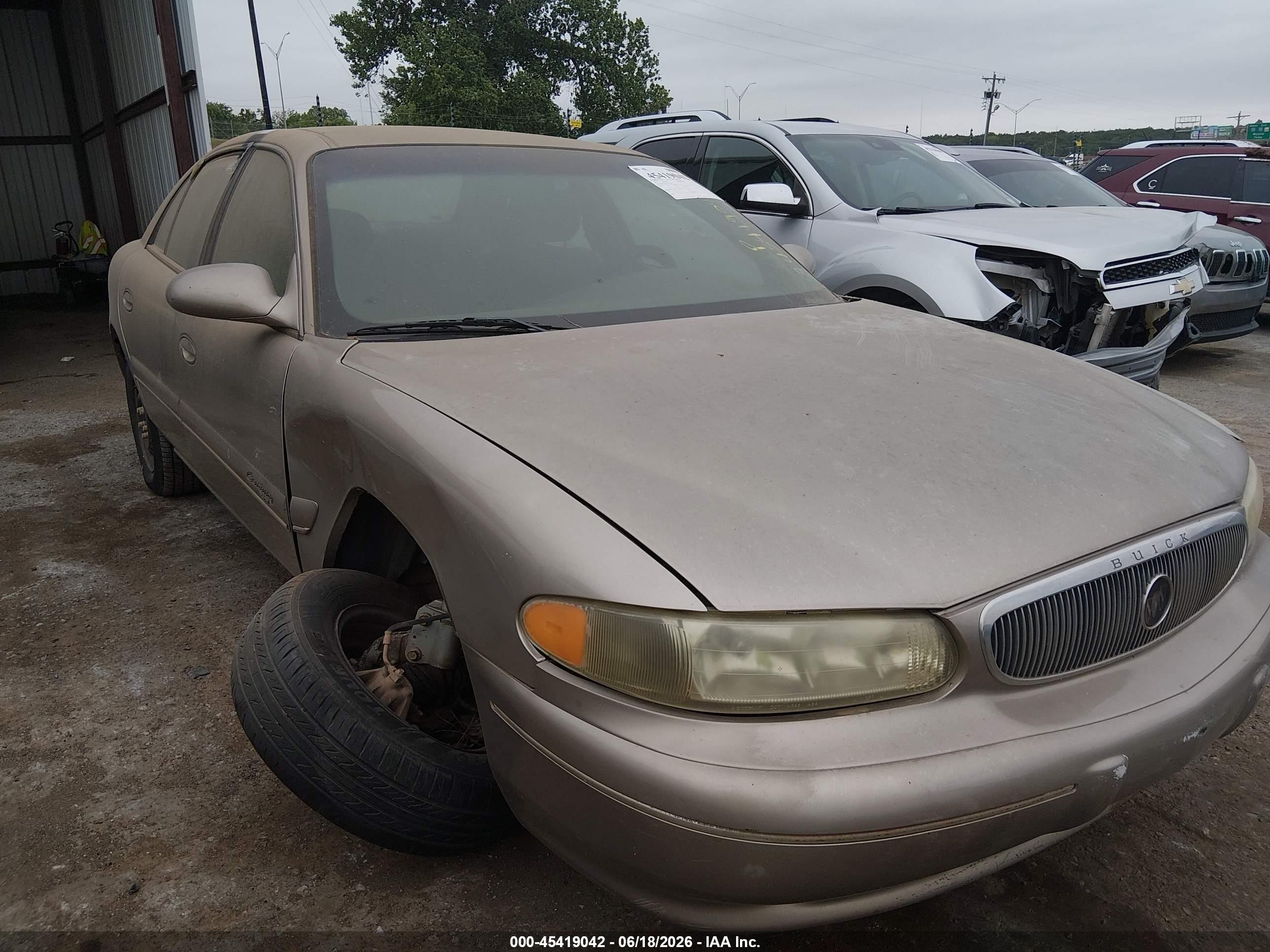 1999 Buick Century Limited Tan vin: 2G4WY52M1X1513705