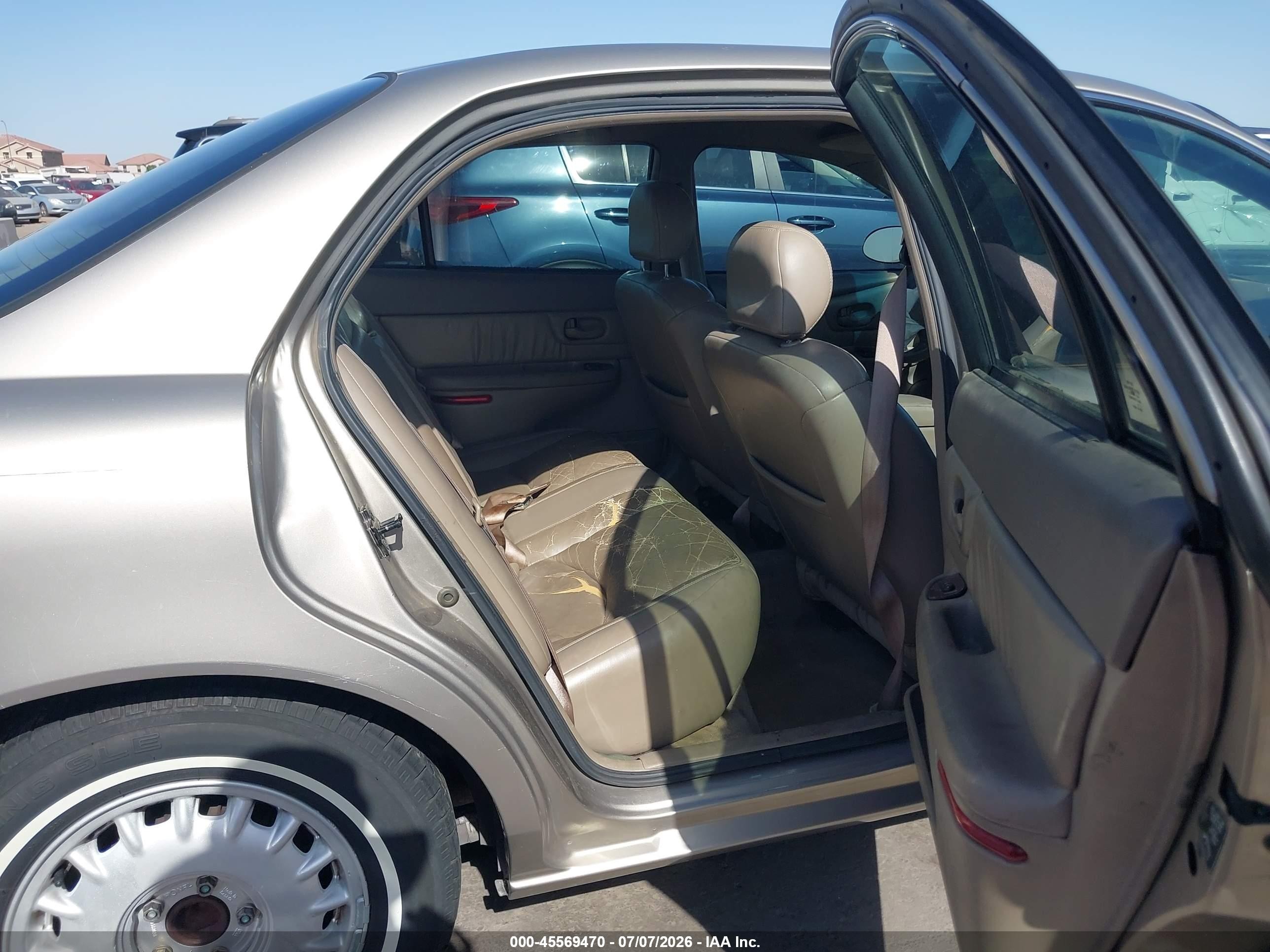 1999 Buick Century Limited Gold vin: 2G4WY52M3X1592388