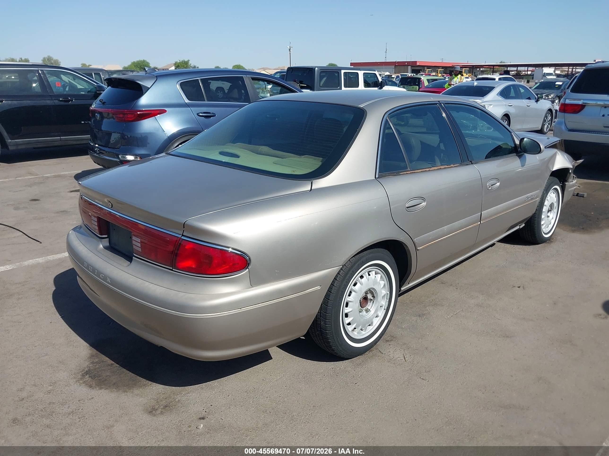 1999 Buick Century Limited Gold vin: 2G4WY52M3X1592388
