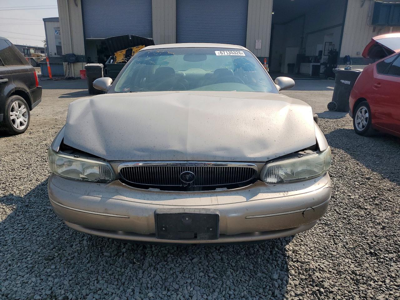 1999 Buick Century Limited Tan vin: 2G4WY52M7X1456216